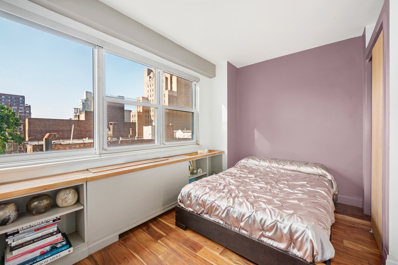 101 West 12th Street, Unit 9C Manhattan, NY 10011 - Photo 5 of 8 a bedroom with a bed and a window