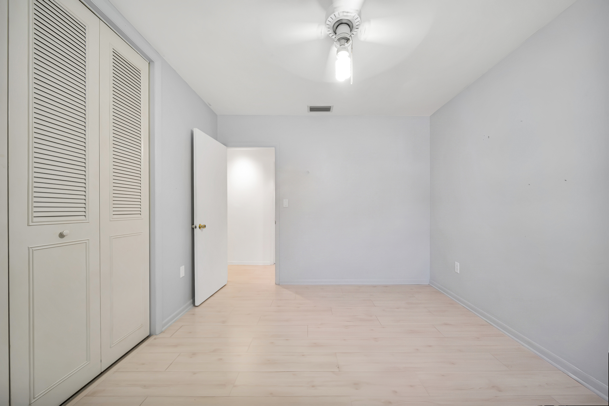 6760 Southwest 62nd Terrace Miami, FL 33143 - Photo 10 of 38 wooden floor in an empty room