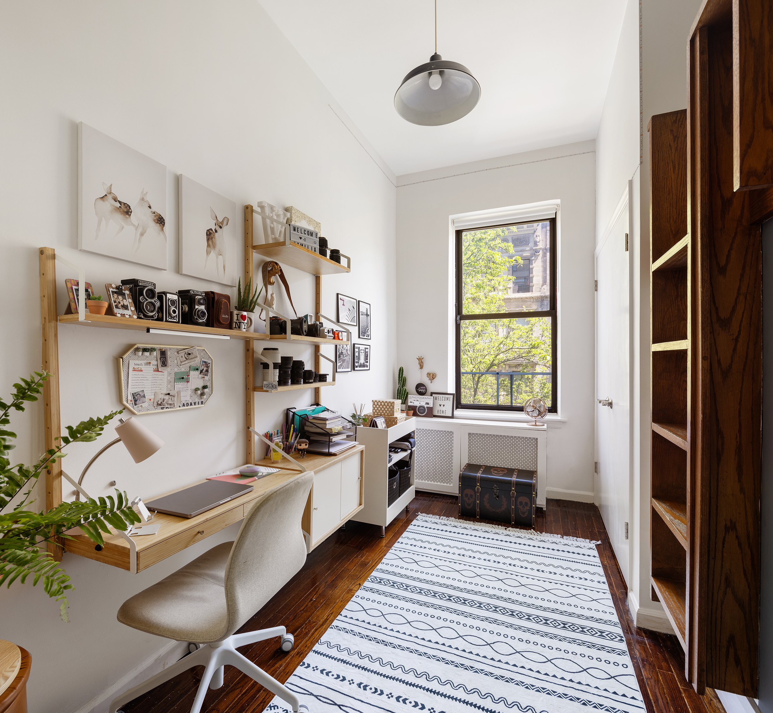144 West 80th Street Manhattan, NY 10024 - Photo 18 of 22 a kitchen with a sink appliances and a window
