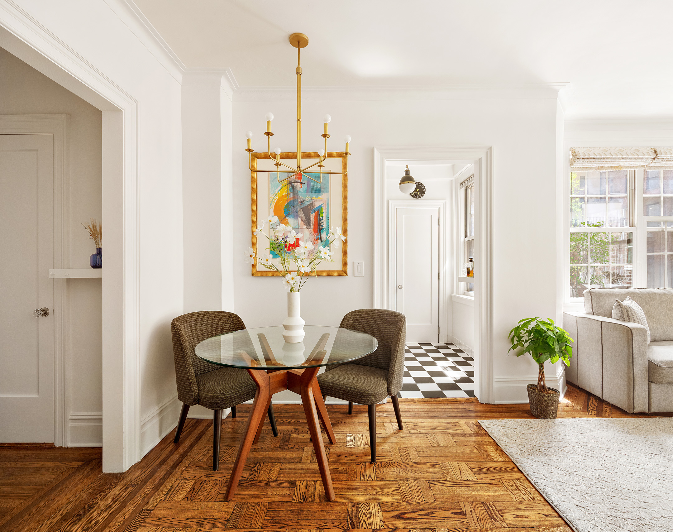 41 5th Avenue, Unit 2F Manhattan, NY 10003 - Photo 4 of 12 a view of a dining room with furniture window and wooden floor