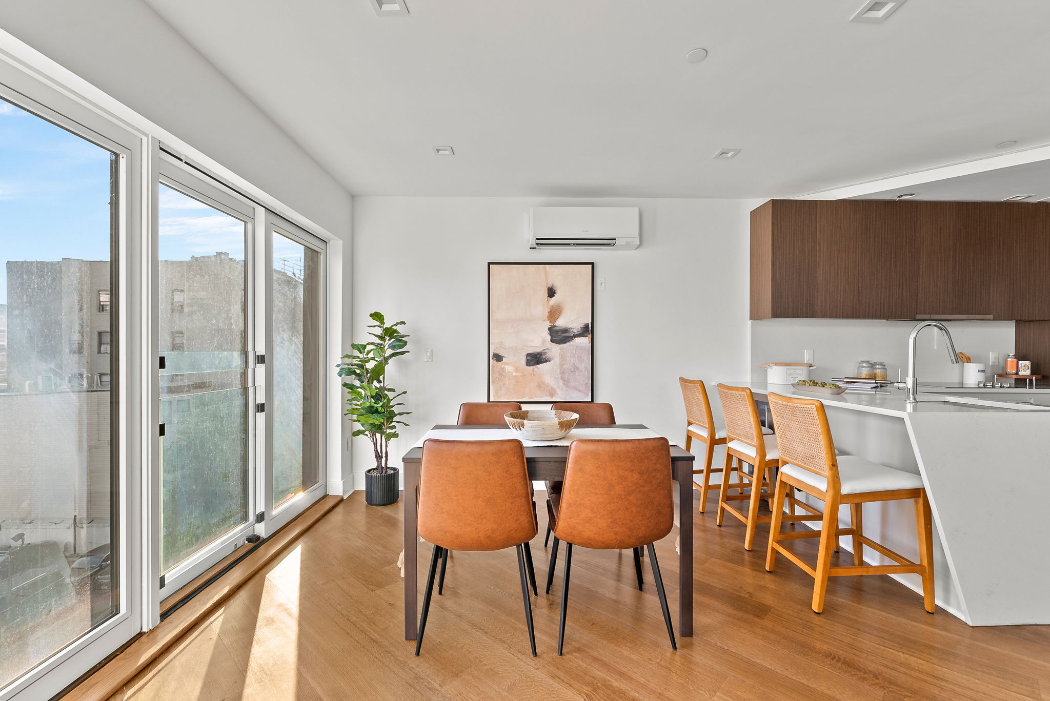553 West 182nd Street, Unit 5R Manhattan, NY 10033 - Photo 5 of 12 a view of a dining room with furniture window and wooden floor