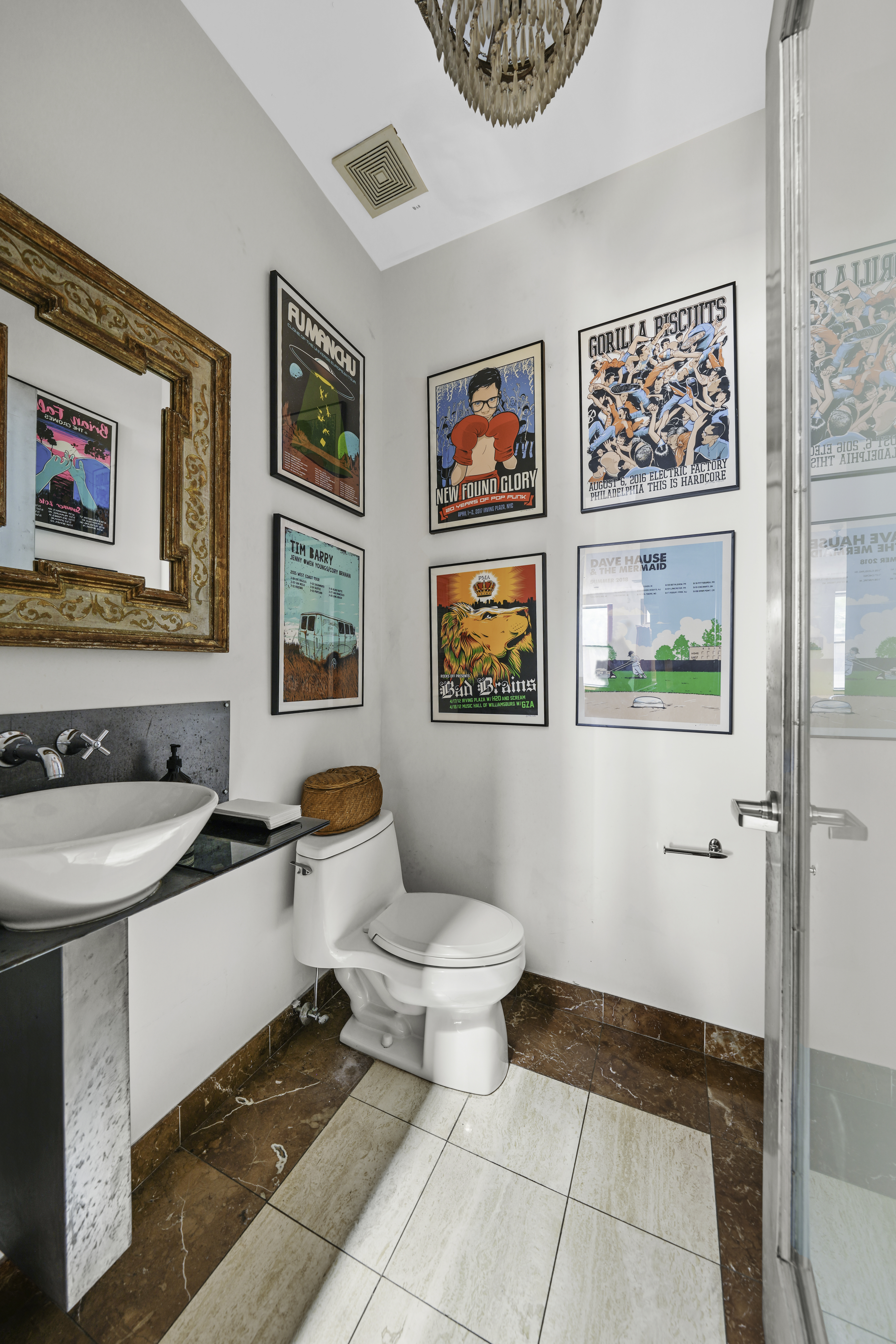 109 West 118th Street Manhattan, NY 10026 - Photo 24 of 31 a bathroom with a sink mirror vanity and toilet