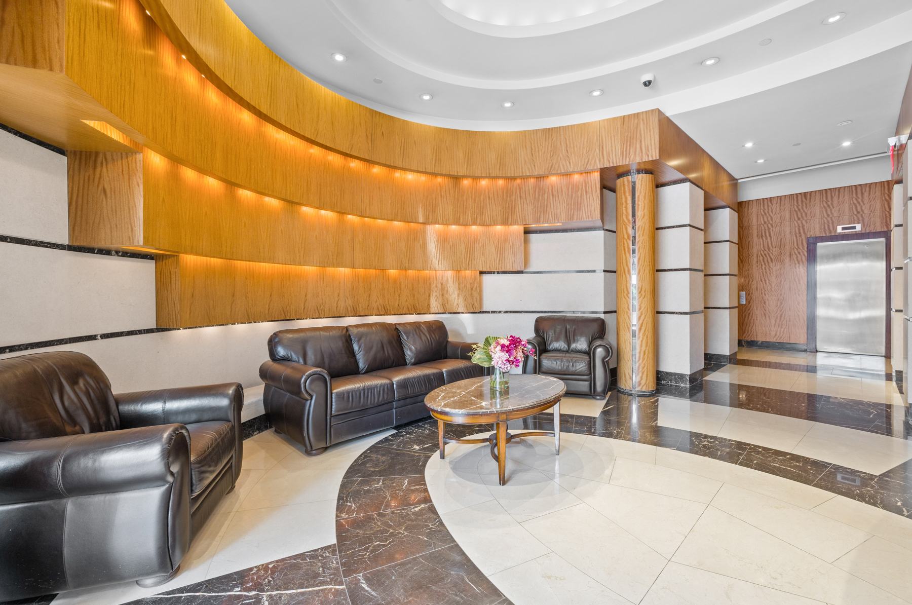 107-24 71st Road, Unit 2E Queens, NY 11375 - Photo 12 of 18 a reading room with furniture and a large window