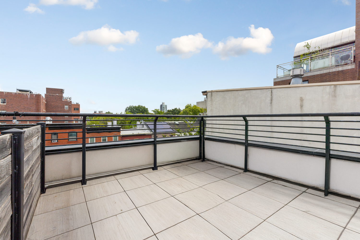 74 Adelphi Street, Unit 2B Brooklyn, NY 11205 - Photo 8 of 9 a view of a terrace with city view