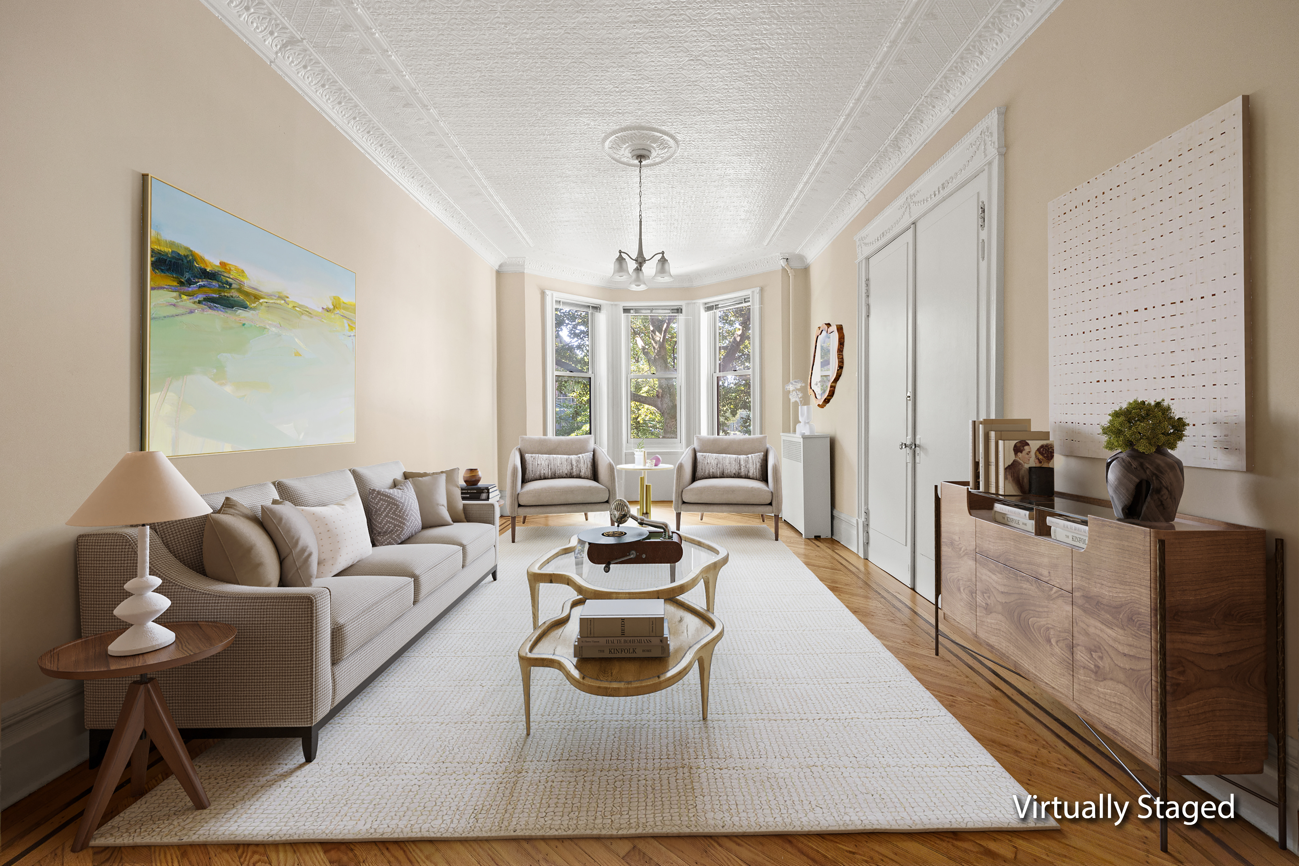 273 Windsor Place Brooklyn, NY 11218 - Photo 2 of 29 a living room with furniture and a chandelier