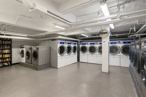 a utility room with washer and dryer