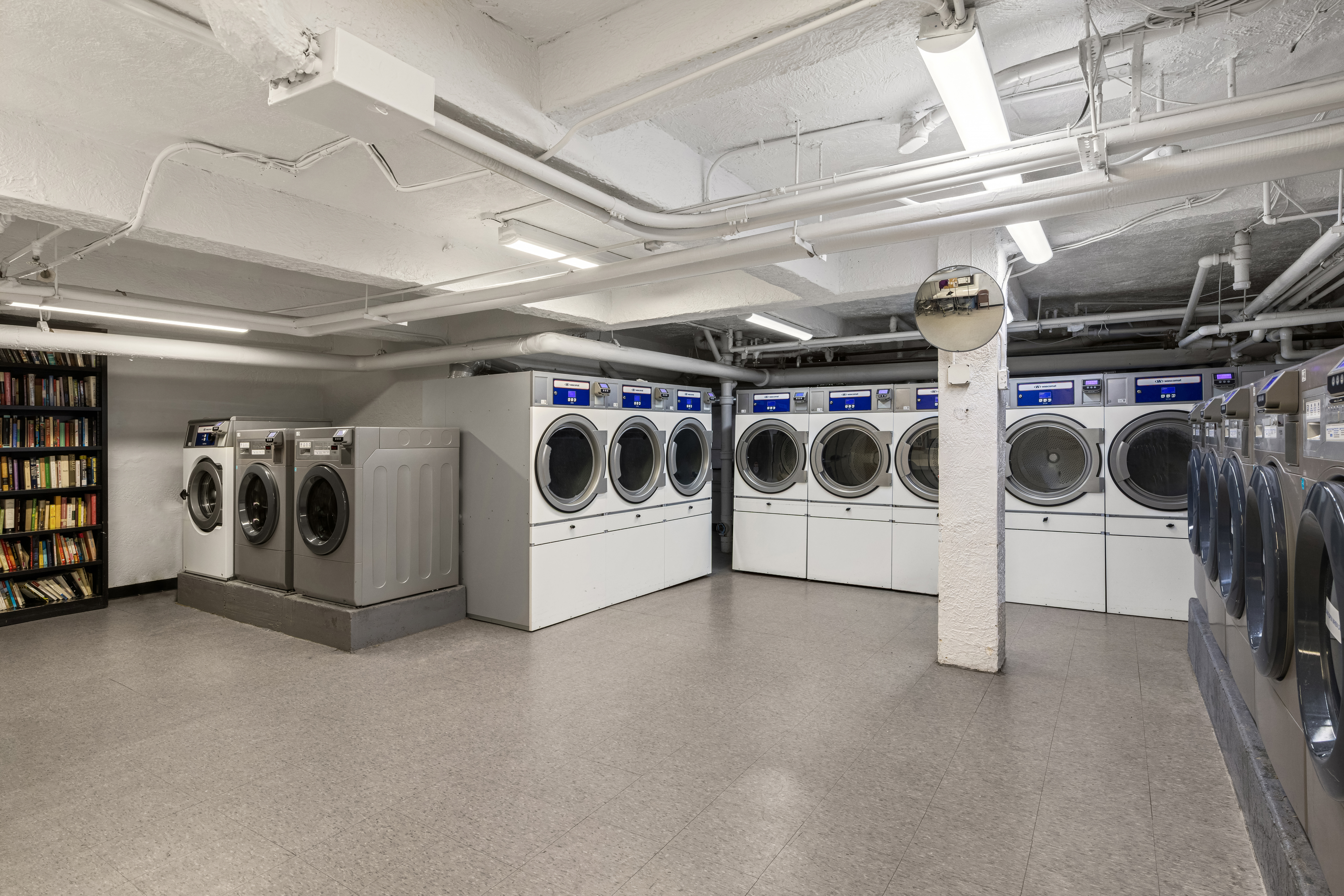 68-61 Yellowstone Boulevard, Unit 618 Queens, NY 11375 - Photo 9 of 13 a utility room with washer and dryer