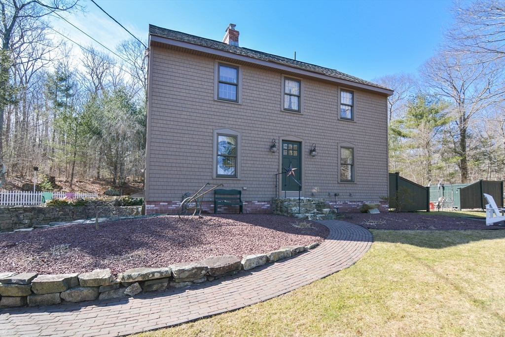 187 Blackstone Street Mendon, MA 01756 - Photo 2 of 42 a view of a house with yard and tree s