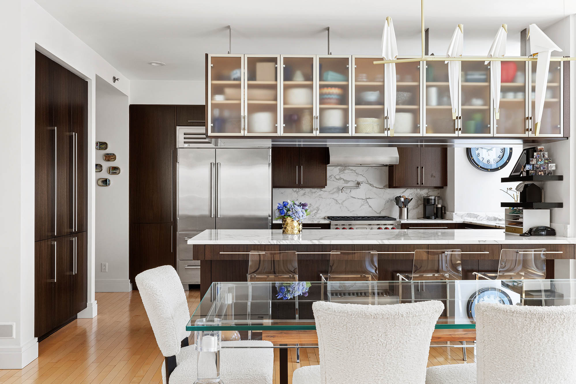 545 West 110th Street, Unit PH11A Manhattan, NY 10025 - Photo 6 of 22 a kitchen with a window and chairs