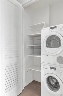 a utility room with dryer and washer
