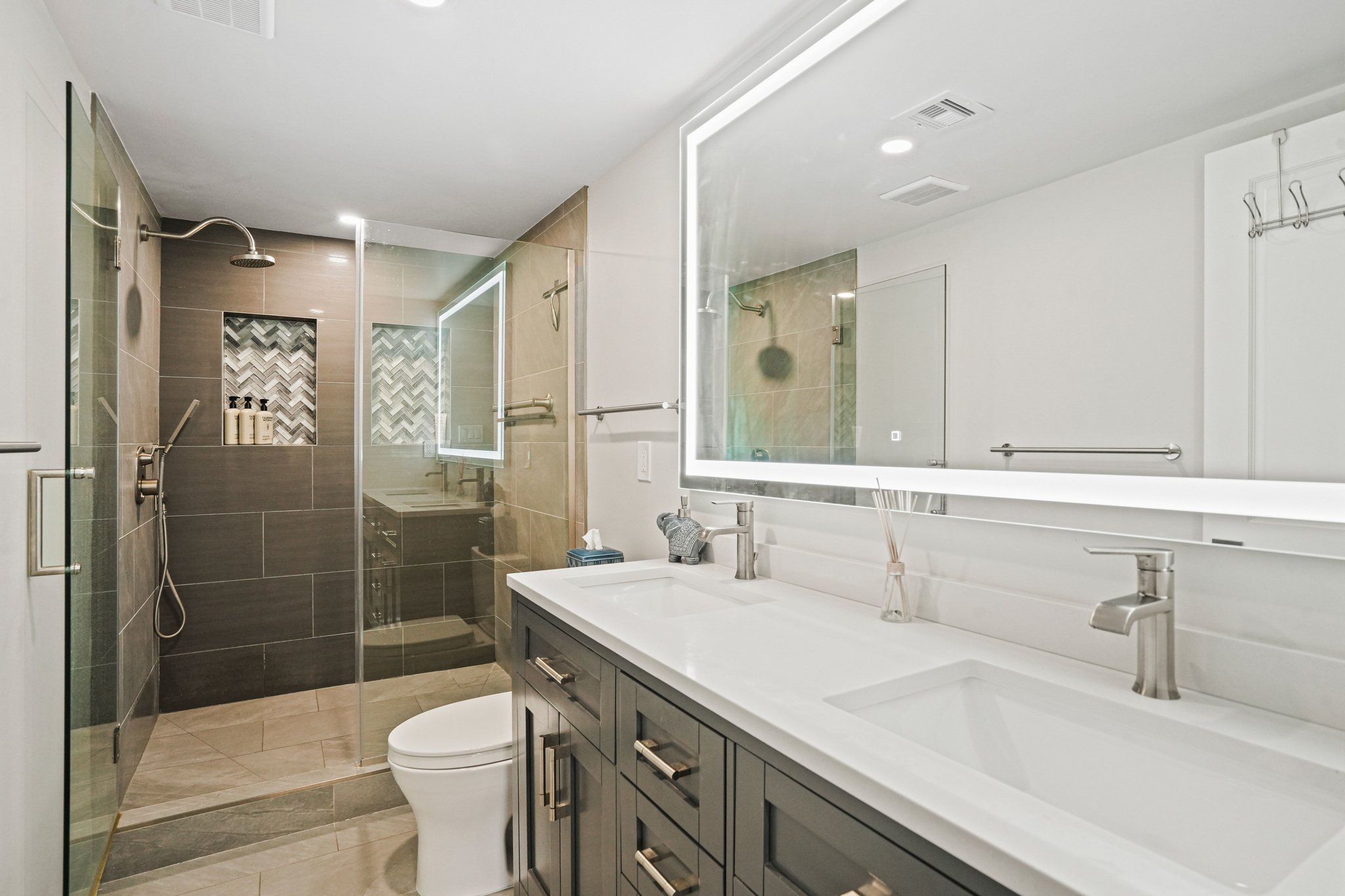 2725 Connecticut Avenue Northwest, Unit 507 Washington, DC 20008 - Photo 15 of 31 a bathroom with a sink a toilet and shower