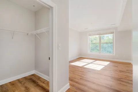 a view of an empty room and window