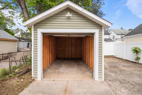a front view of a house with a garage