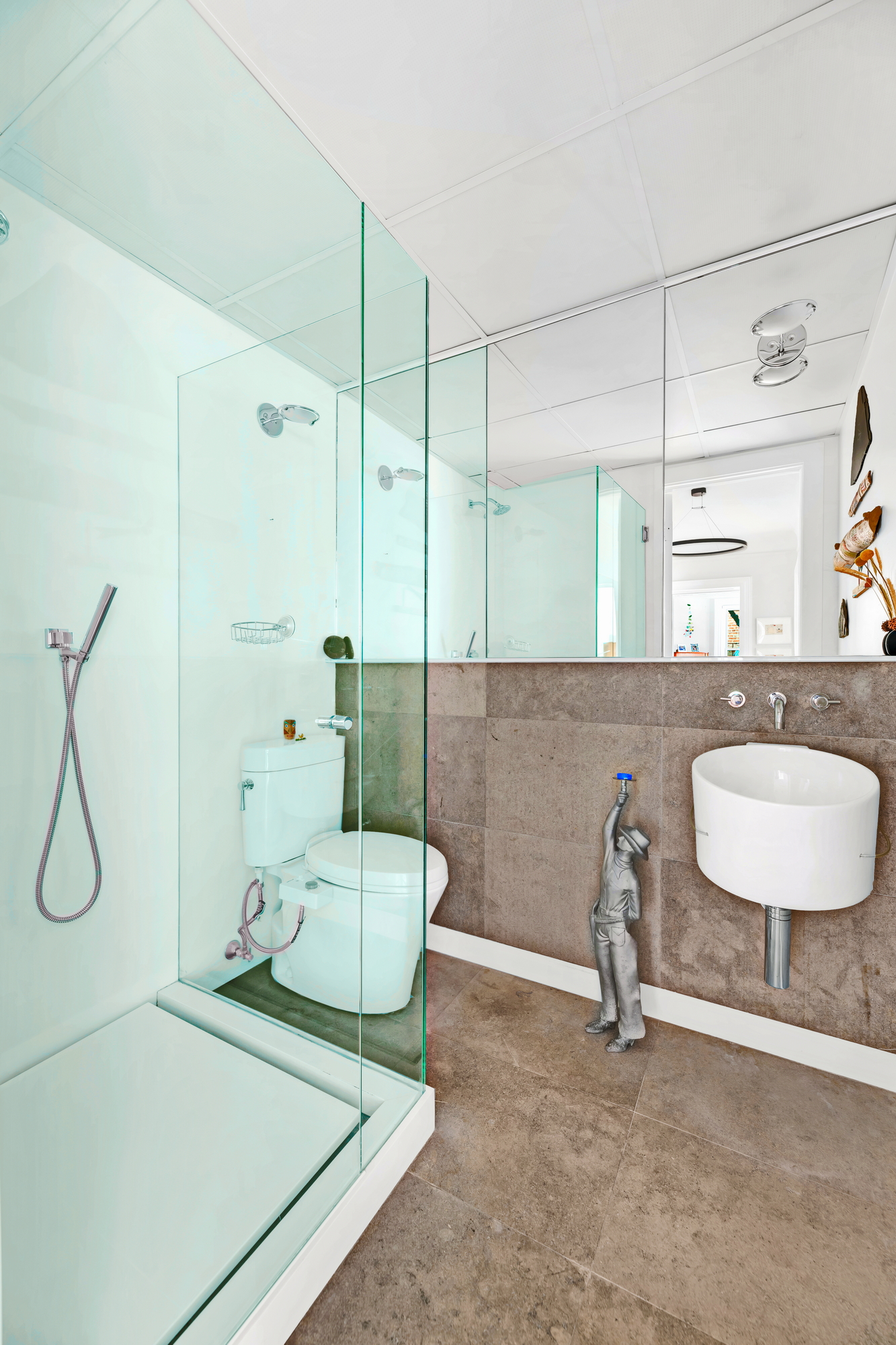 254 West 82nd Street, Unit 5A Manhattan, NY 10024 - Photo 11 of 18 a bathroom with a sink and a mirror