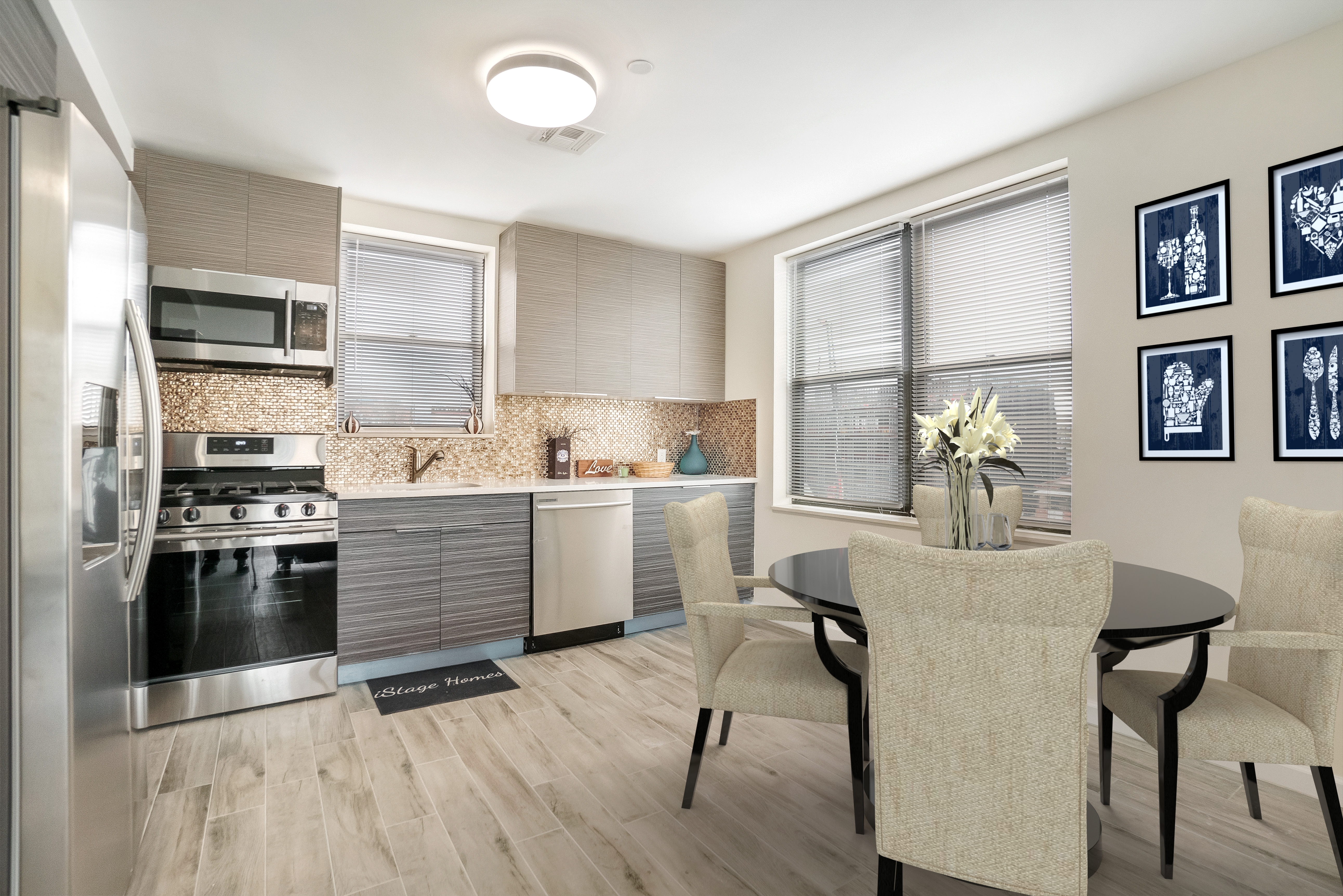 407 Oceanview Avenue, Unit PH Brooklyn, NY 11235 - Photo 2 of 16 a kitchen with a sink appliances cabinets and furniture