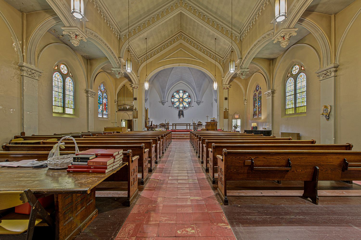 a living room with furniture a rug and a fireplace