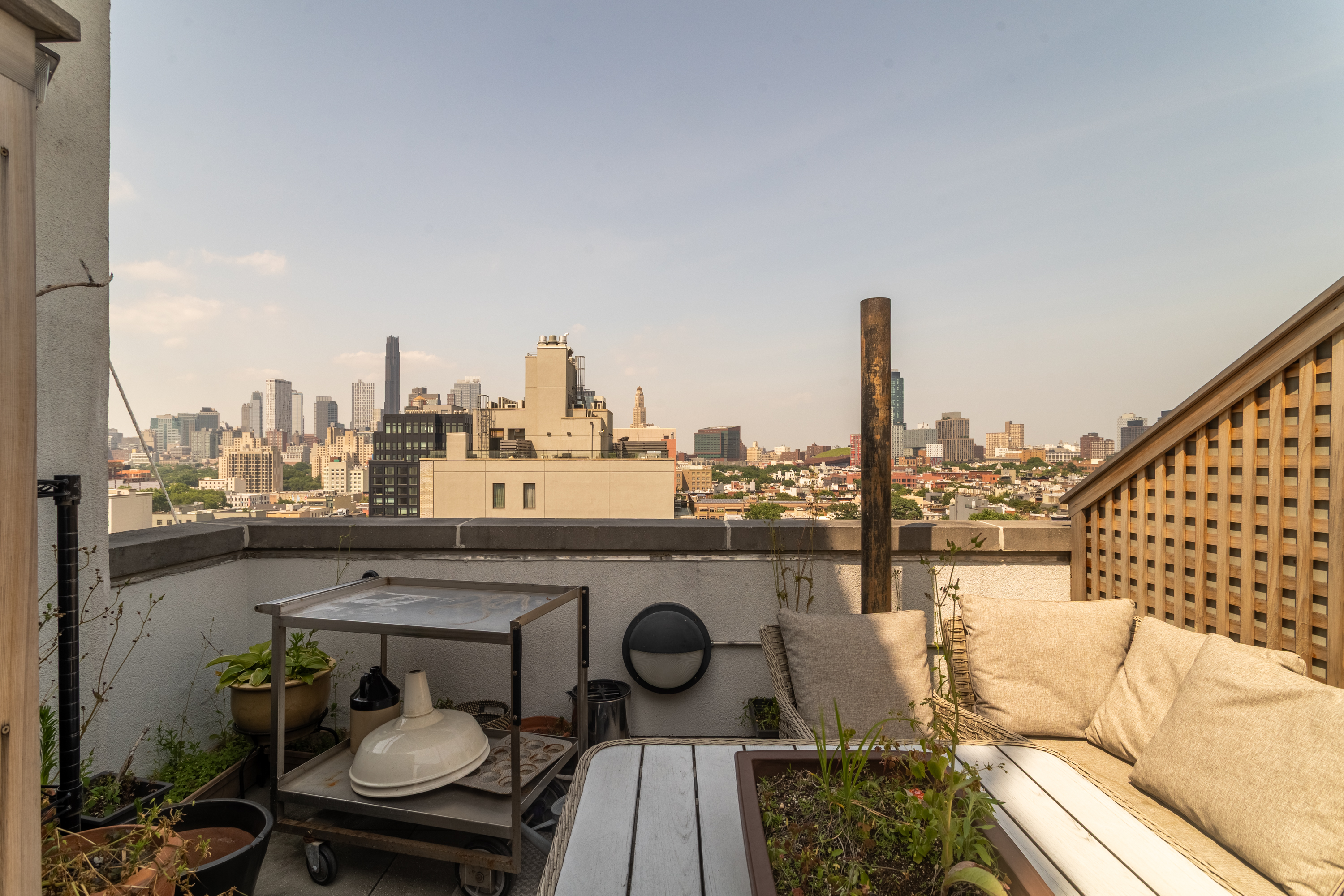 560 Carroll Street, Unit 11A Brooklyn, NY 11215 - Photo 12 of 15 a view of roof deck with seating space and city view