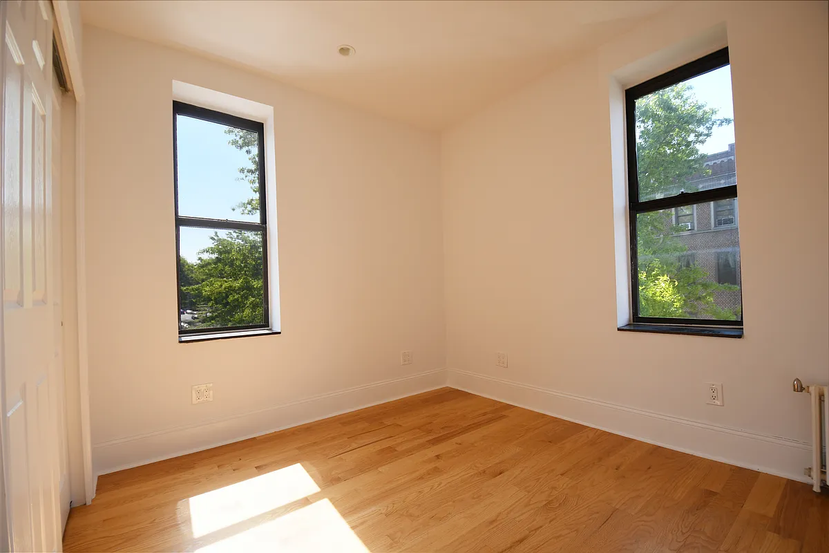 1059 Union Street, Unit B3 Brooklyn, NY 11225 - Photo 4 of 8 an empty room with a window