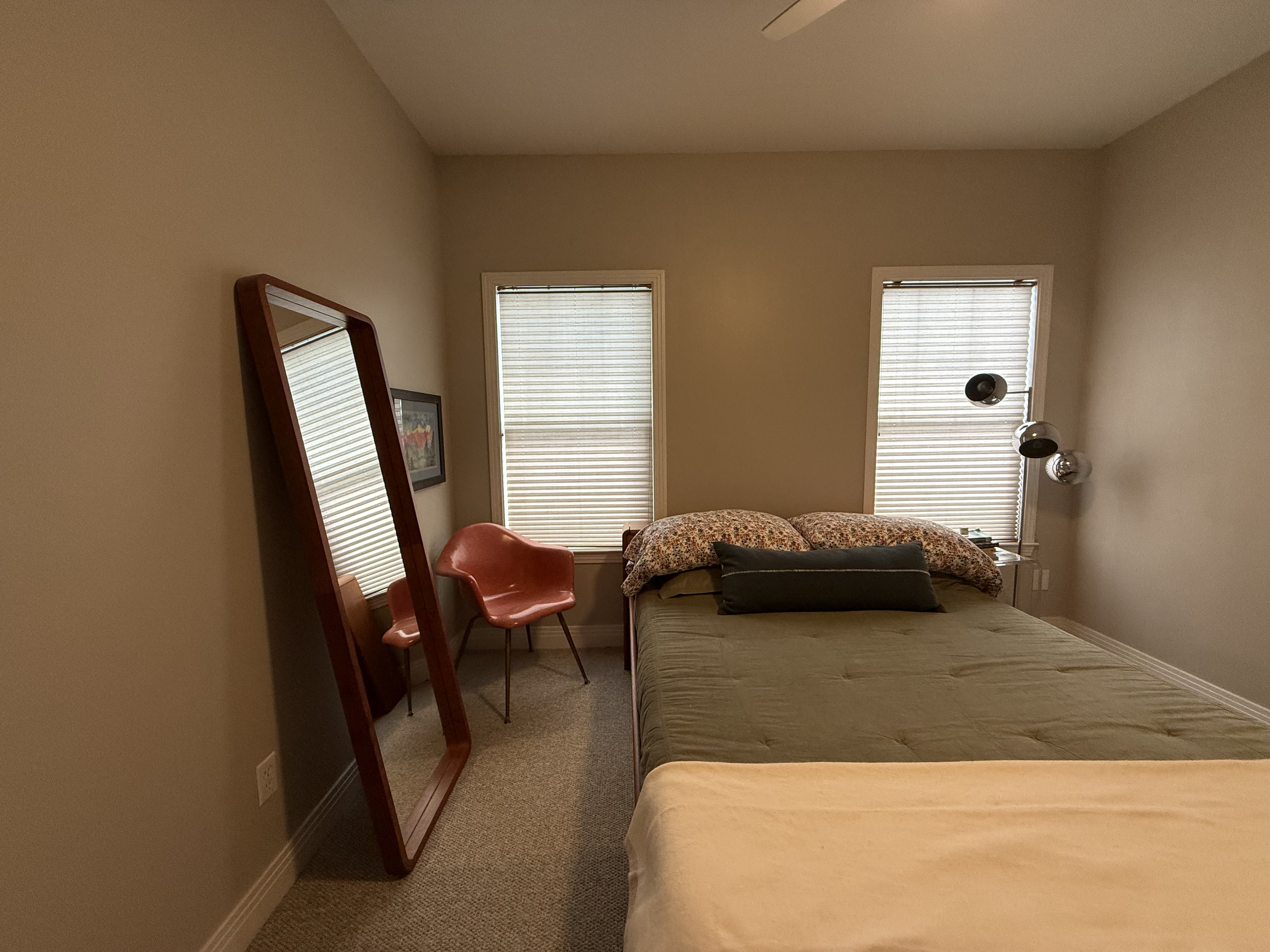 5108 Eilers Avenue Austin, TX 78751 - Photo 11 of 13 a bedroom with a bed and a chair