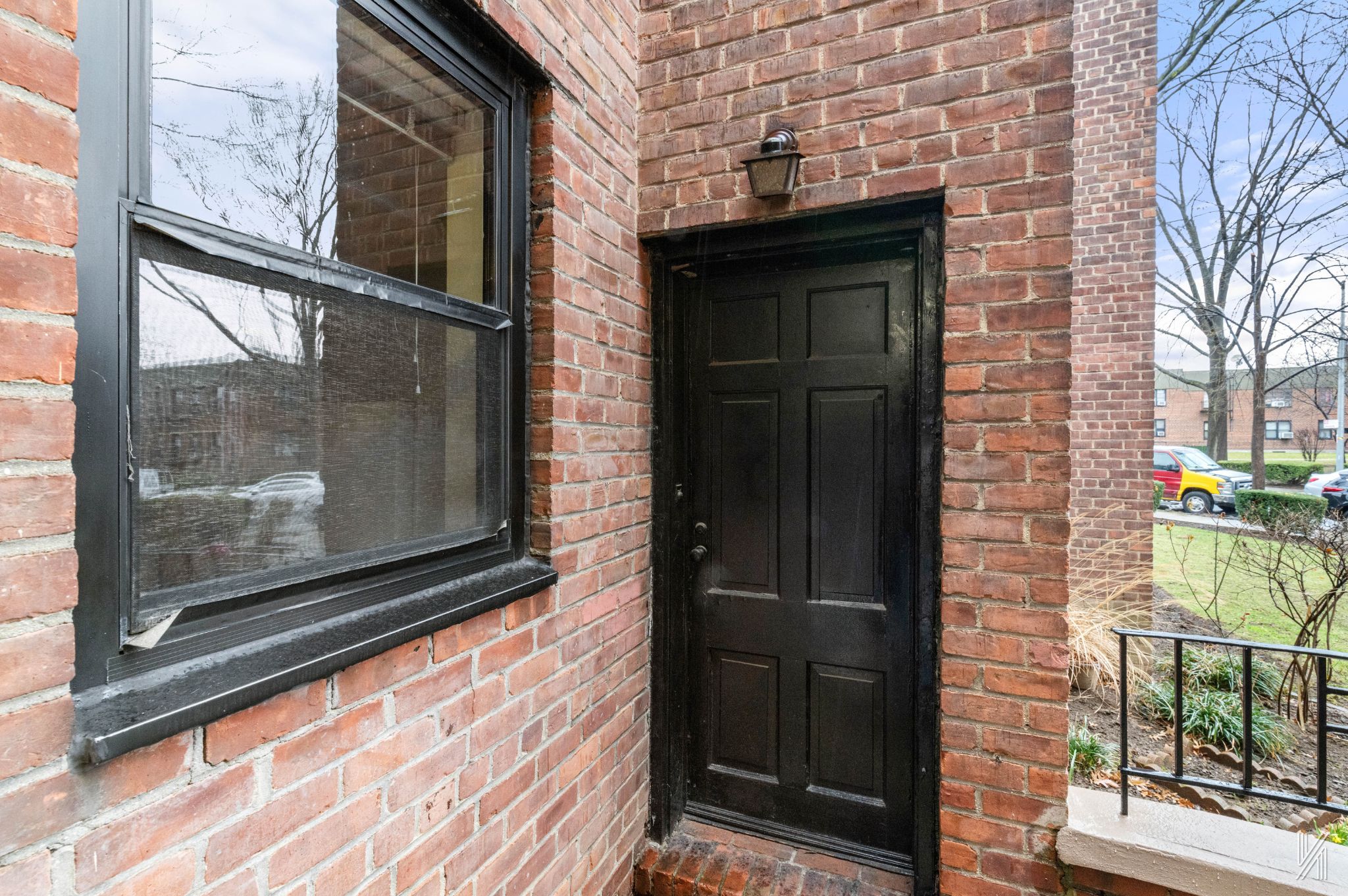22-60 79th Street, Unit 1A Queens, NY 11370 - Photo 16 of 17 a view of a door front of a house