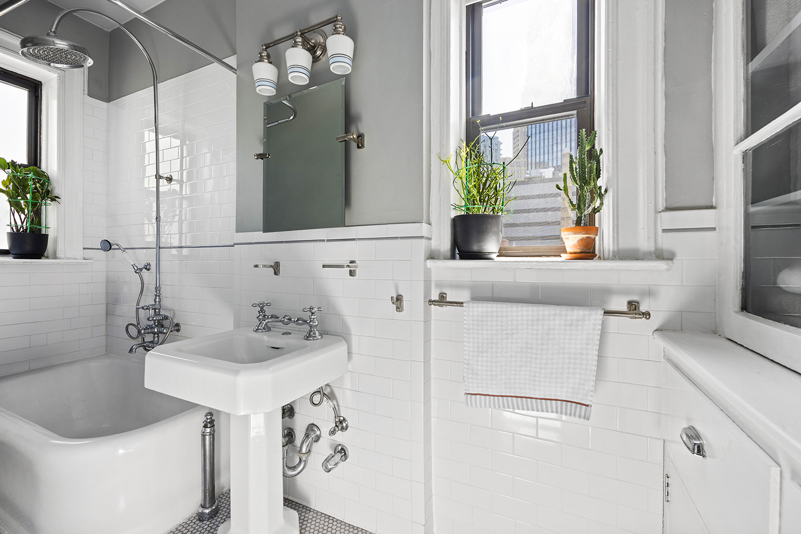 457 State Street, Unit 4BC Brooklyn, NY 11217 - Photo 7 of 13 a bathroom with a sink and a mirror