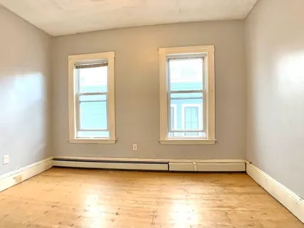 an empty room with window