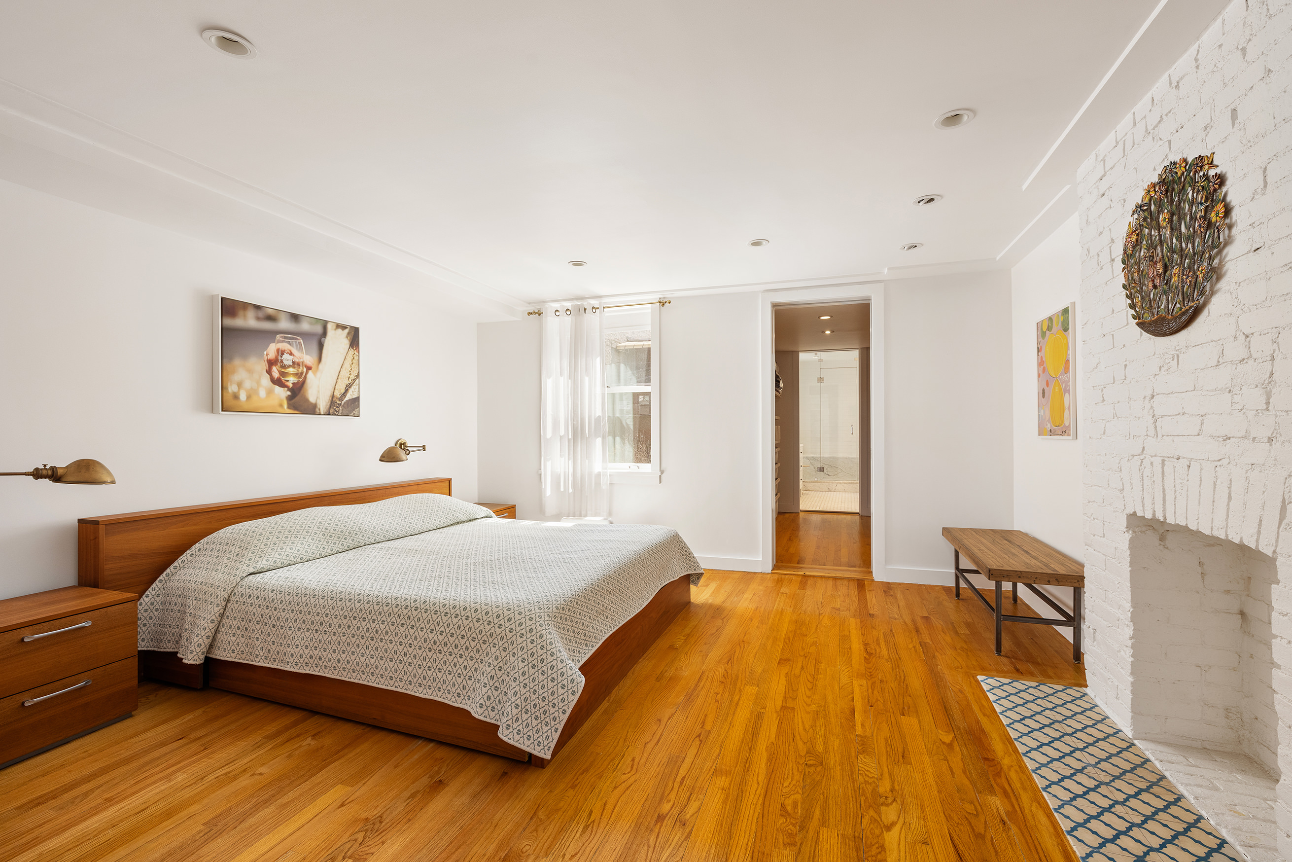 338 Metropolitan Avenue Brooklyn, NY 11211 - Photo 7 of 18 a spacious bedroom with a bed and a window