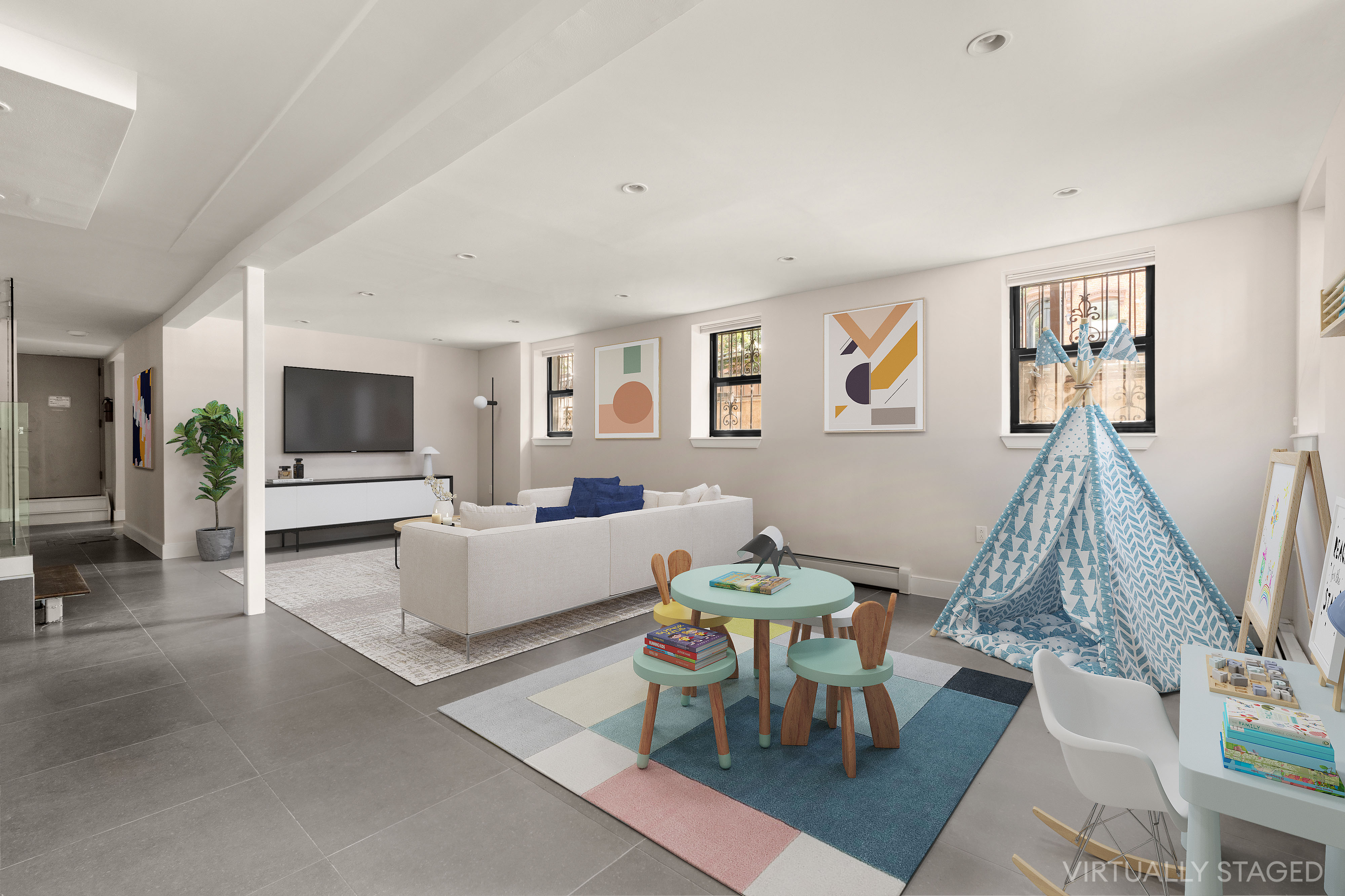 71 Irving Place, Unit 1 Brooklyn, NY 11238 - Photo 9 of 14 a living room with furniture and a flat screen tv