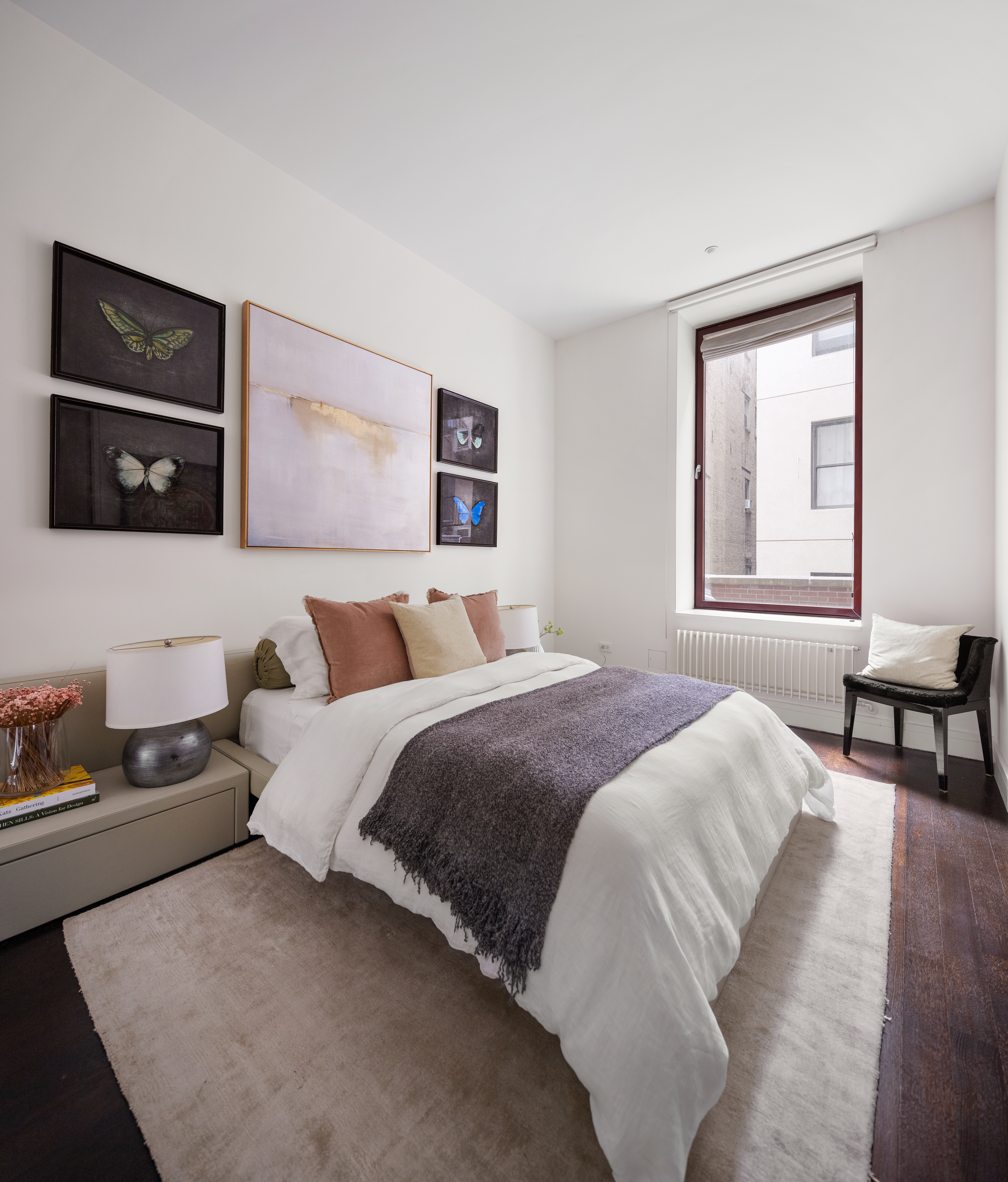 388 West Broadway, Unit 2 Manhattan, NY 10012 - Photo 20 of 27 a bedroom with a bed and a flat screen tv