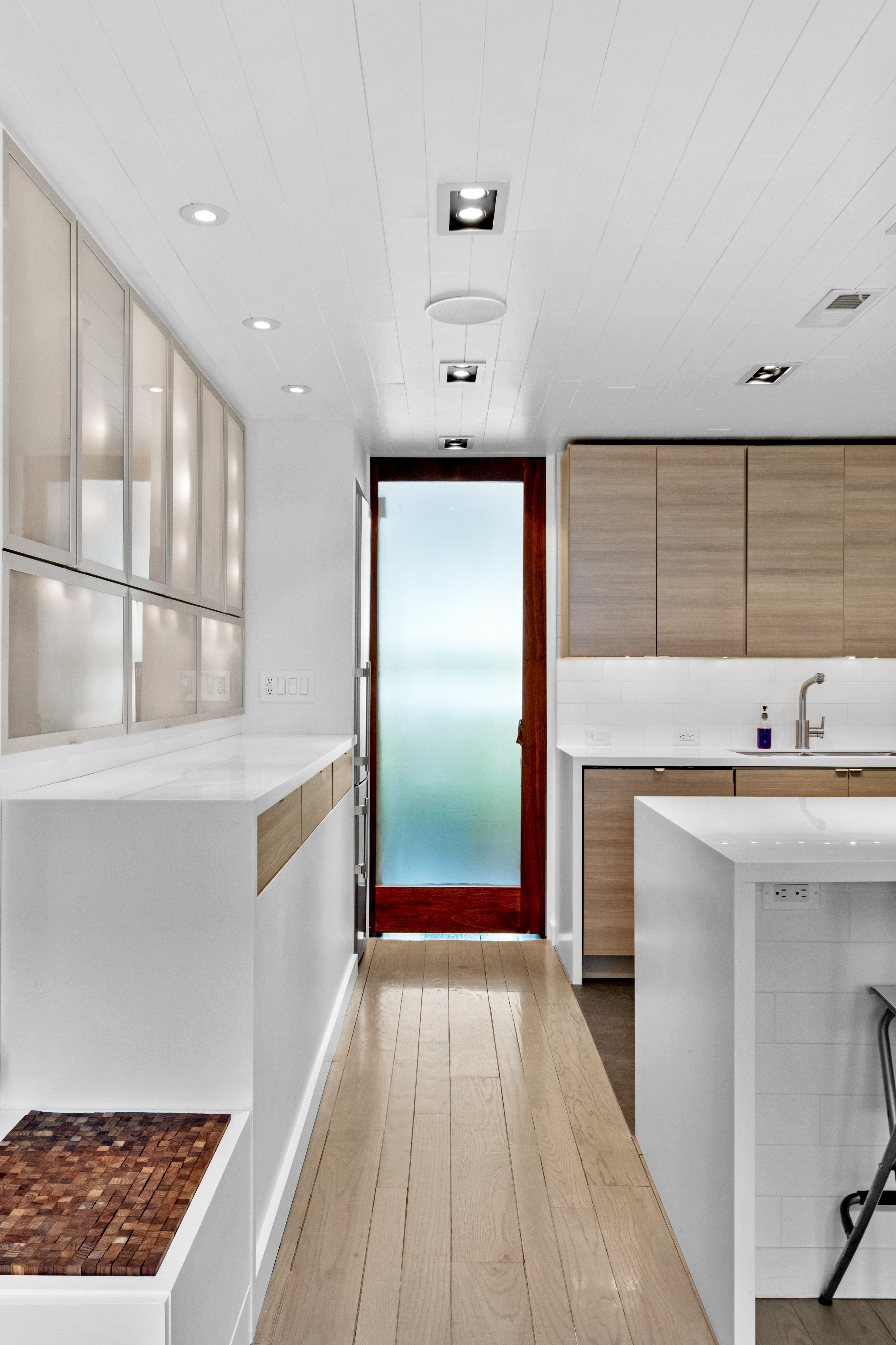 256 1/2 South 3rd Street Philadelphia, PA 19106 - Photo 11 of 73 a view of a kitchen with a sink and dishwasher with wooden floor