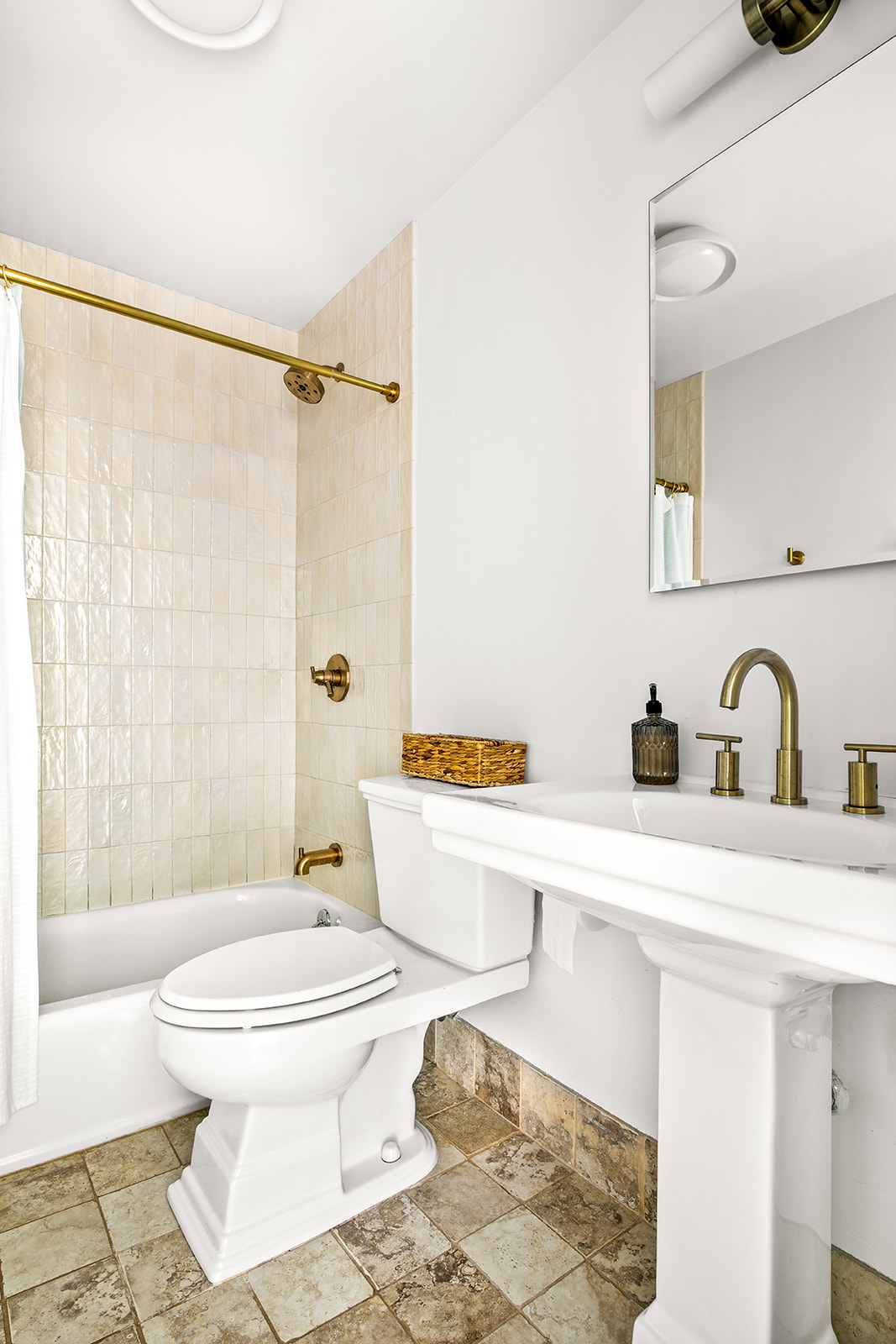 127 4th Place, Unit 2A Brooklyn, NY 11231 - Photo 5 of 6 a bathroom with a sink a toilet and a bathtub