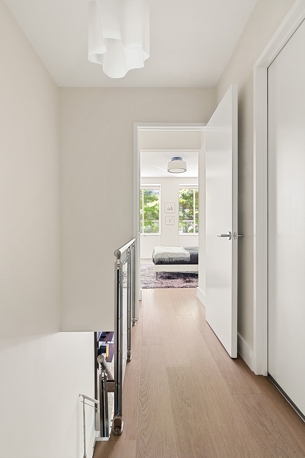 167 Perry Street, Unit 1D/2D Manhattan, NY 10014 - Photo 5 of 13 a view of a hallway with a living room