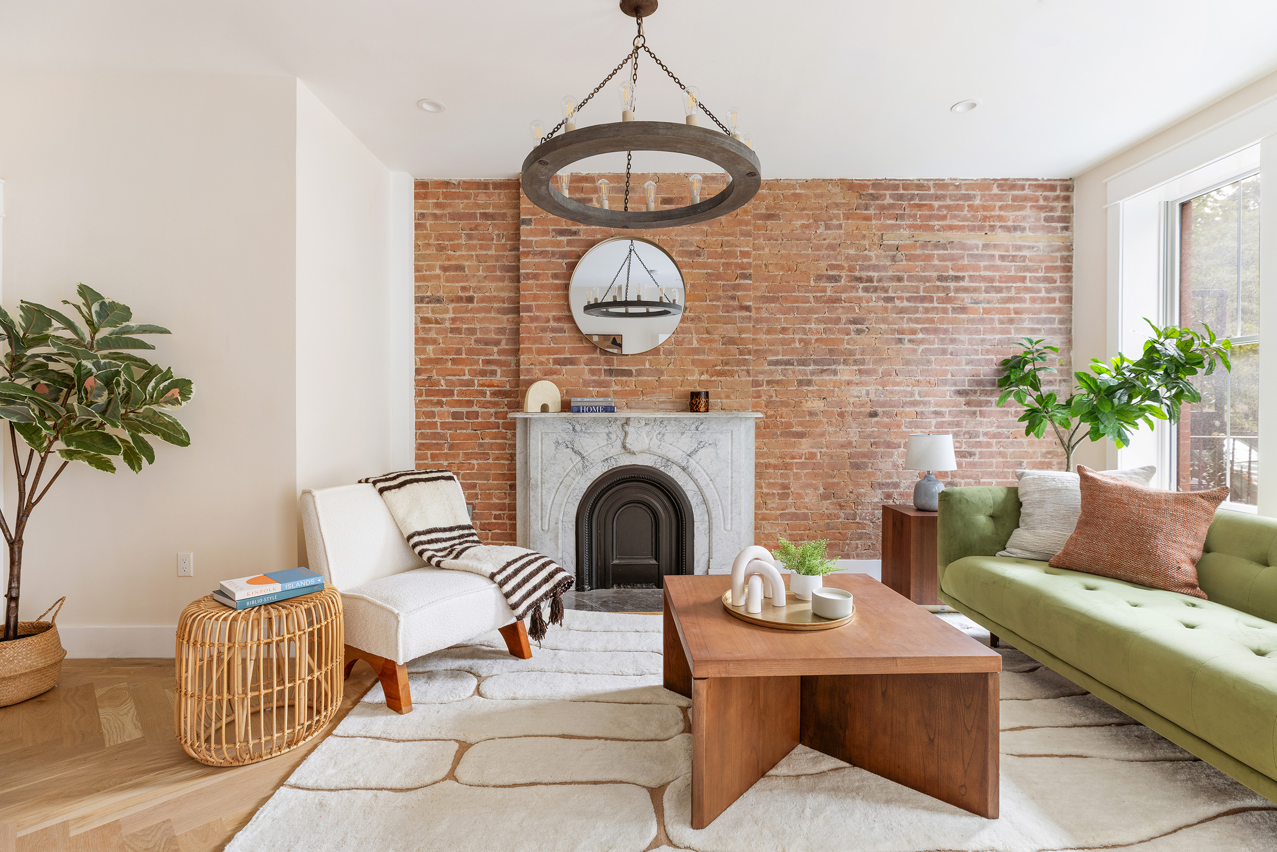 167 Putnam Avenue, Unit MF Brooklyn, NY 11216 - Photo 2 of 19 a living room with furniture and a fireplace