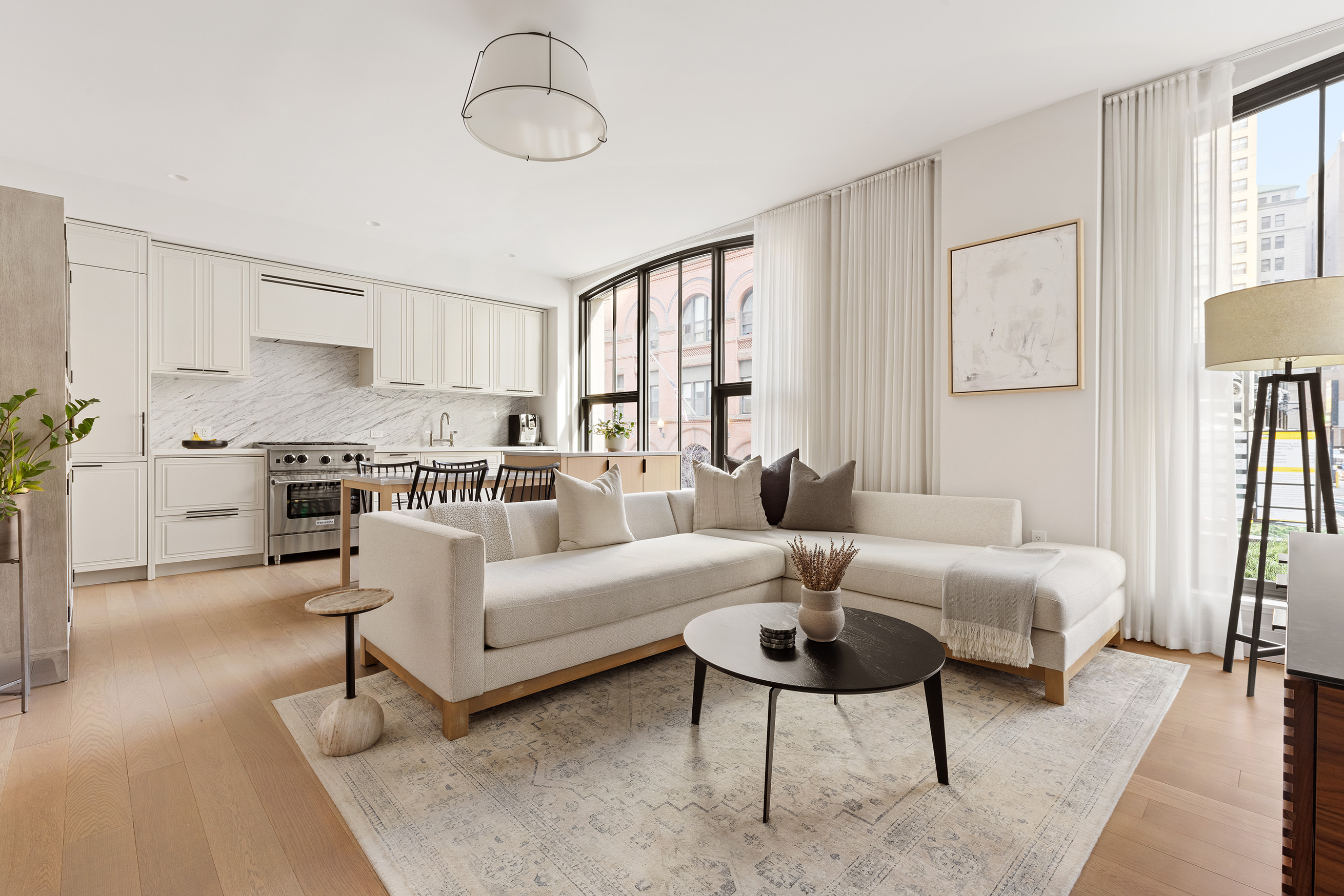 76 Schermerhorn Street, Unit 2C Brooklyn, NY 11201 - Photo 1 of 16 a living room with furniture and a table