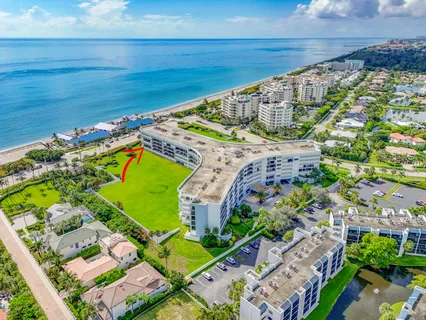 a view of a pathway of a building from a balcony