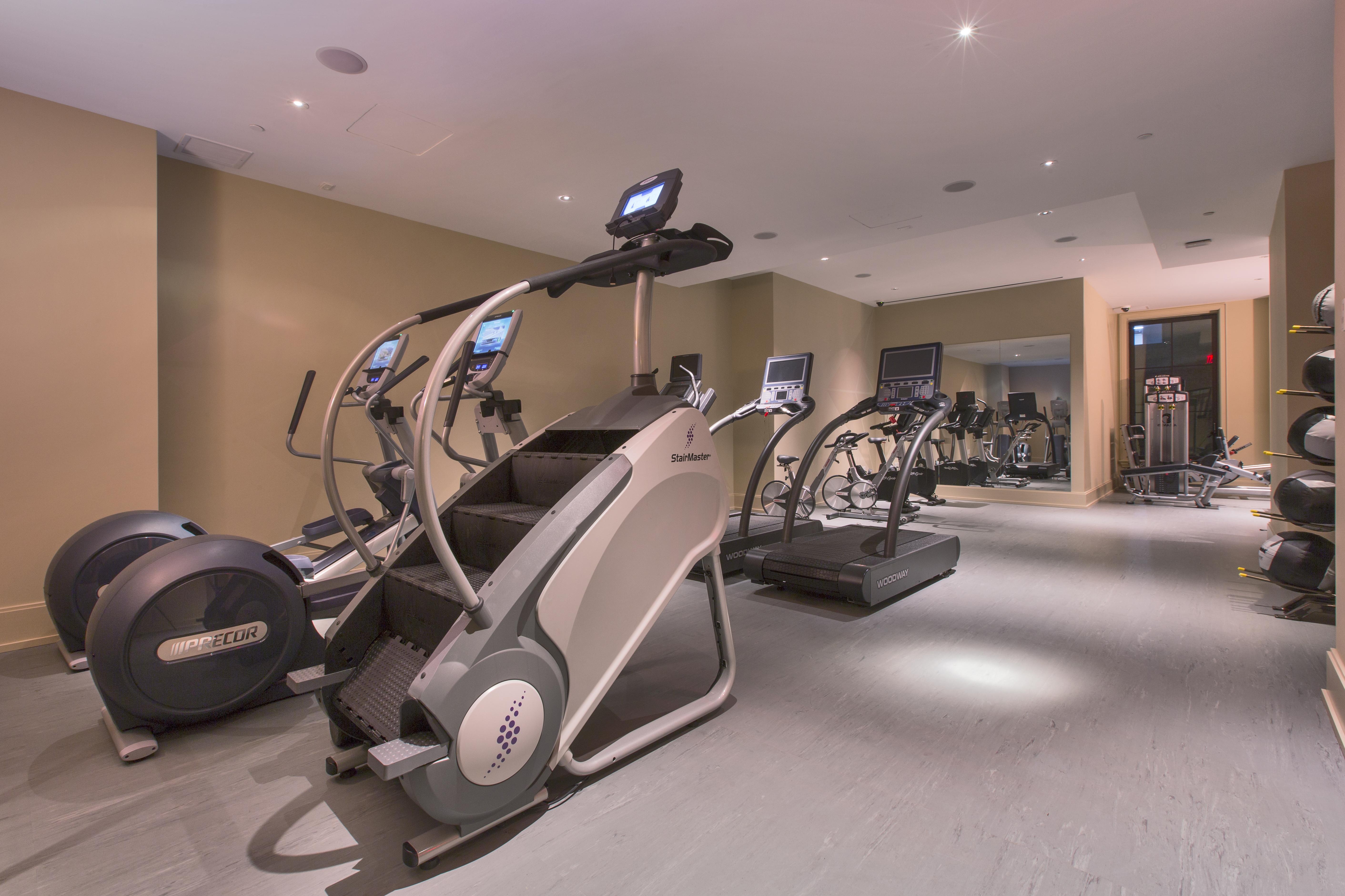 212 West 18th Street, Unit 19C Manhattan, NY 10011 - Photo 23 of 27 a view of a room with gym equipment