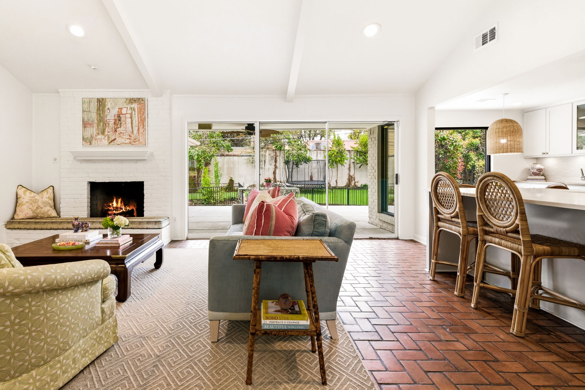 5765 Stonegate Road Dallas, TX 75209 - Photo 9 of 37 a living room with furniture and a fireplace