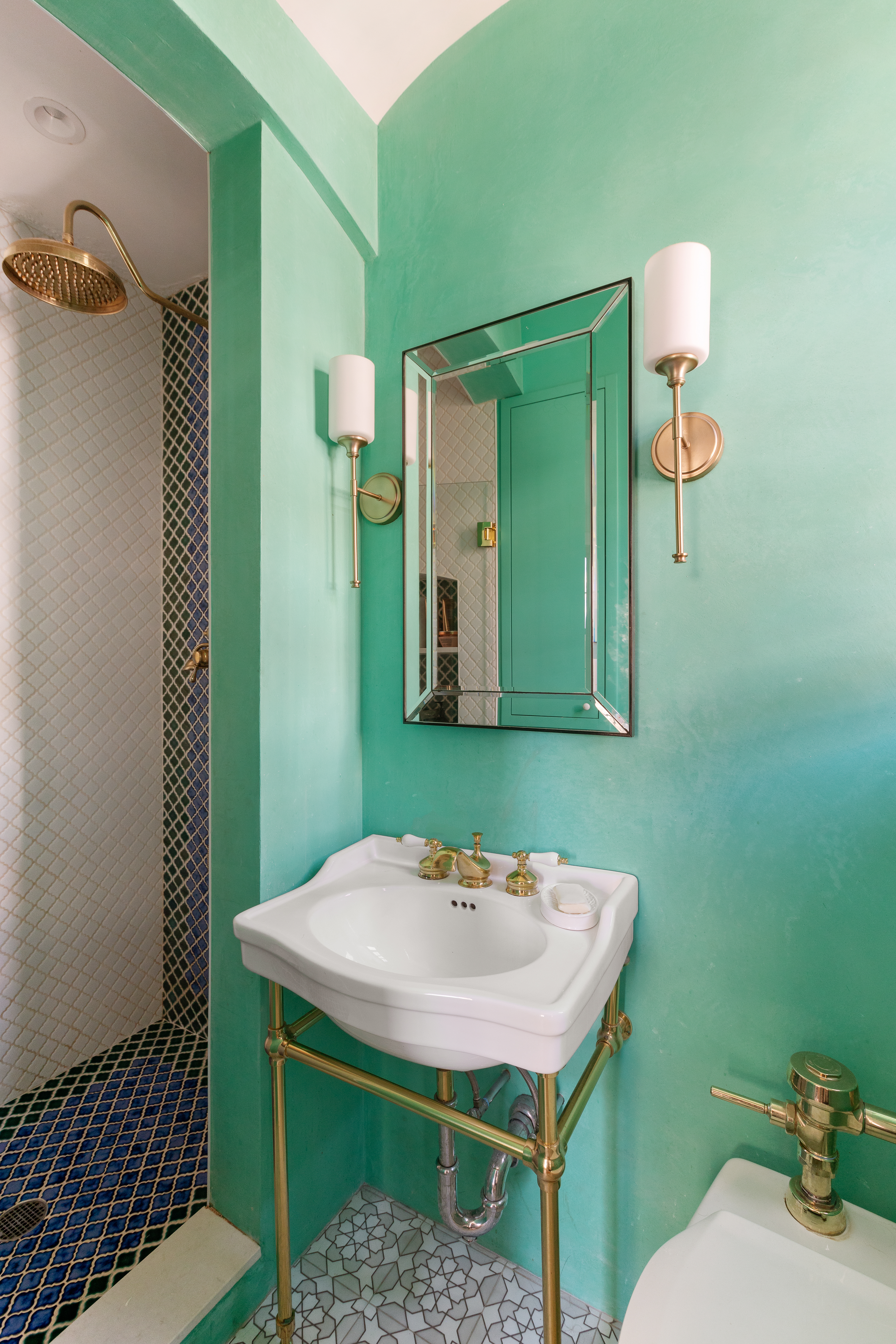 145 Hicks Street, Unit A51 Brooklyn, NY 11201 - Photo 7 of 9 a bathroom with a sink a toilet and mirror
