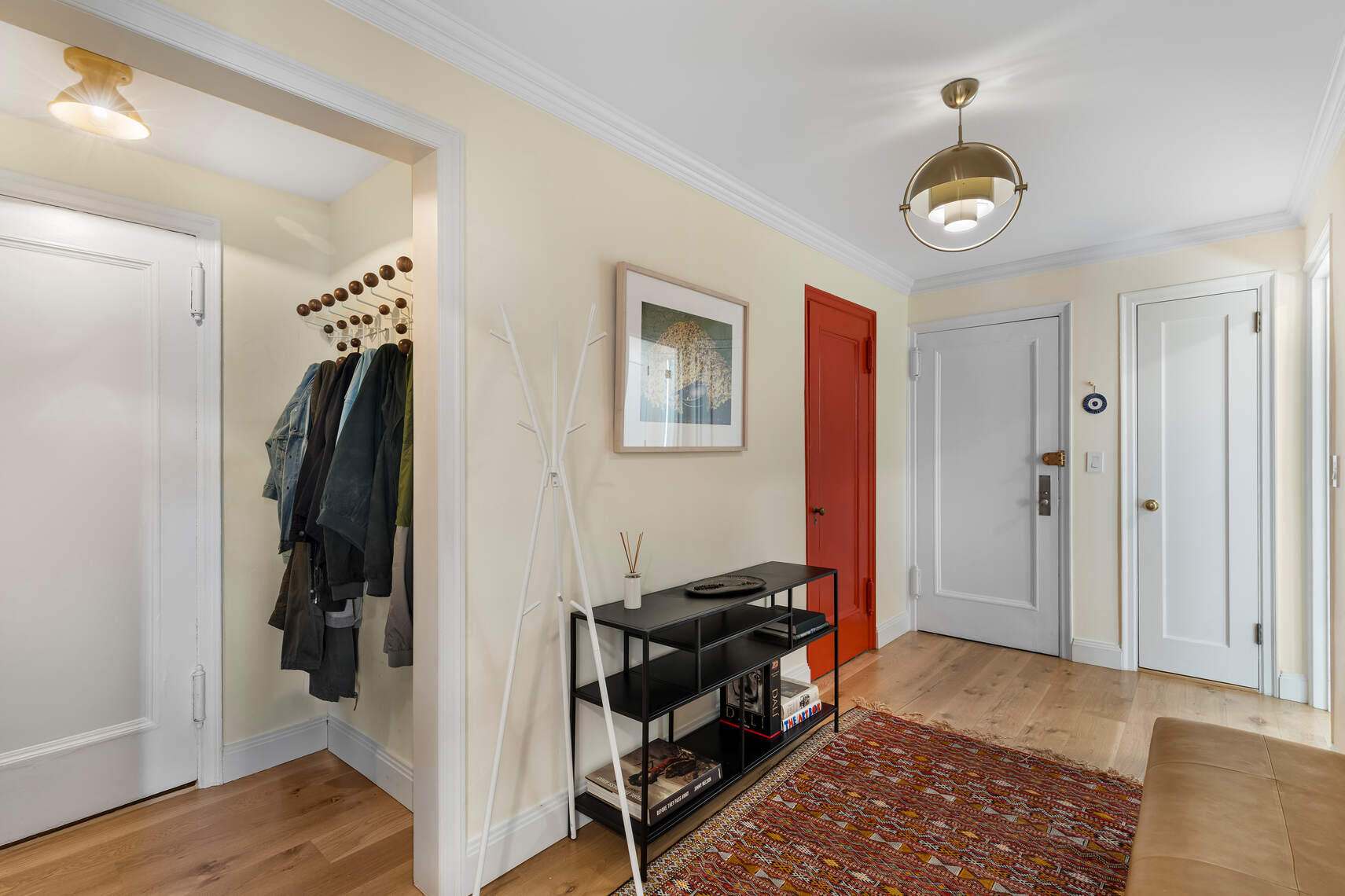47 Plaza Street West, Unit 5B Brooklyn, NY 11217 - Photo 6 of 14 a view of a hallway with entryway and wooden floor