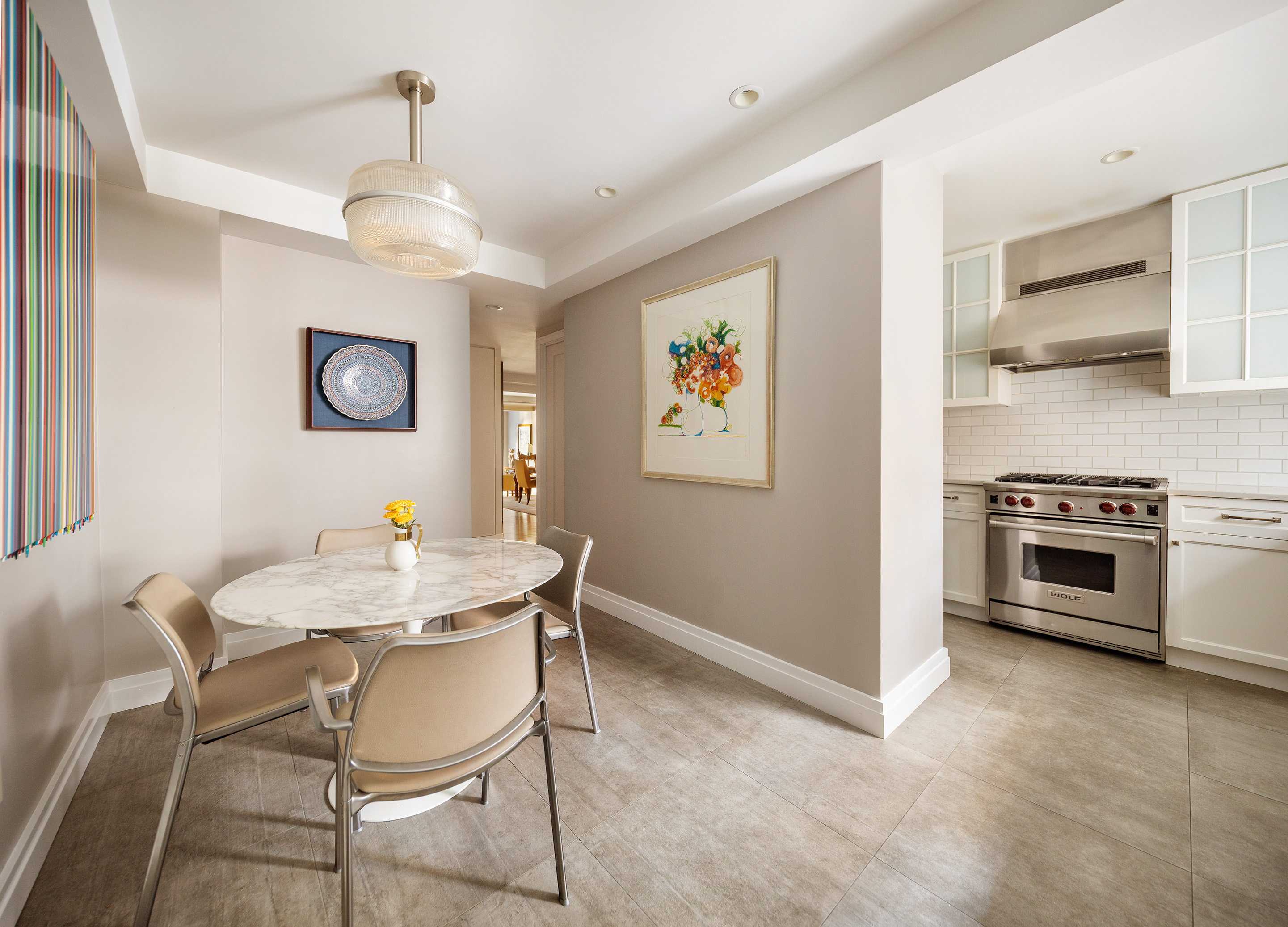 450 West End Avenue, Unit 3B Manhattan, NY 10024 - Photo 4 of 13 a view of a dining room with furniture