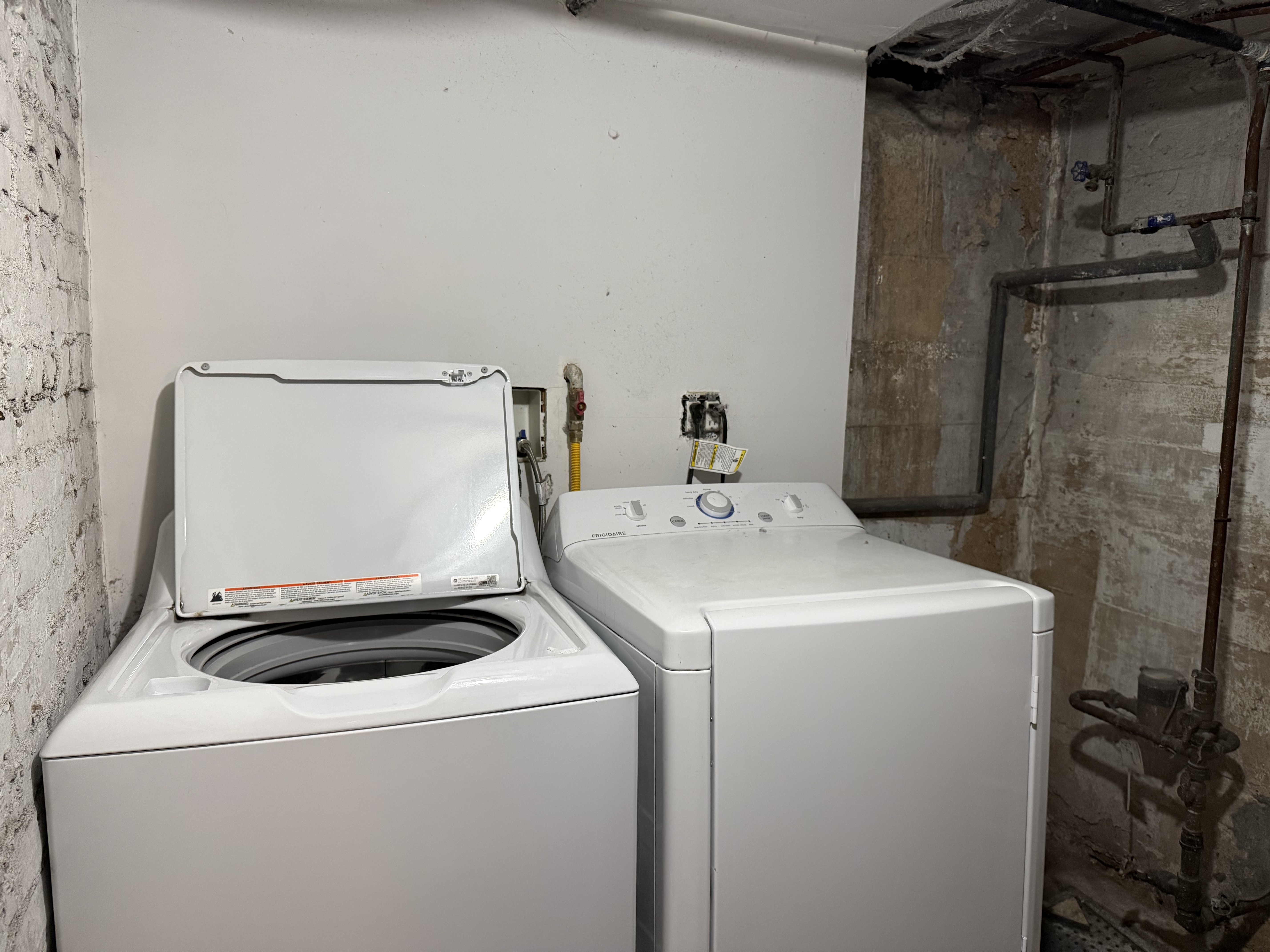 249 94th Street, Unit 1 Brooklyn, NY 11209 - Photo 11 of 13 a utility room with dryer and washer