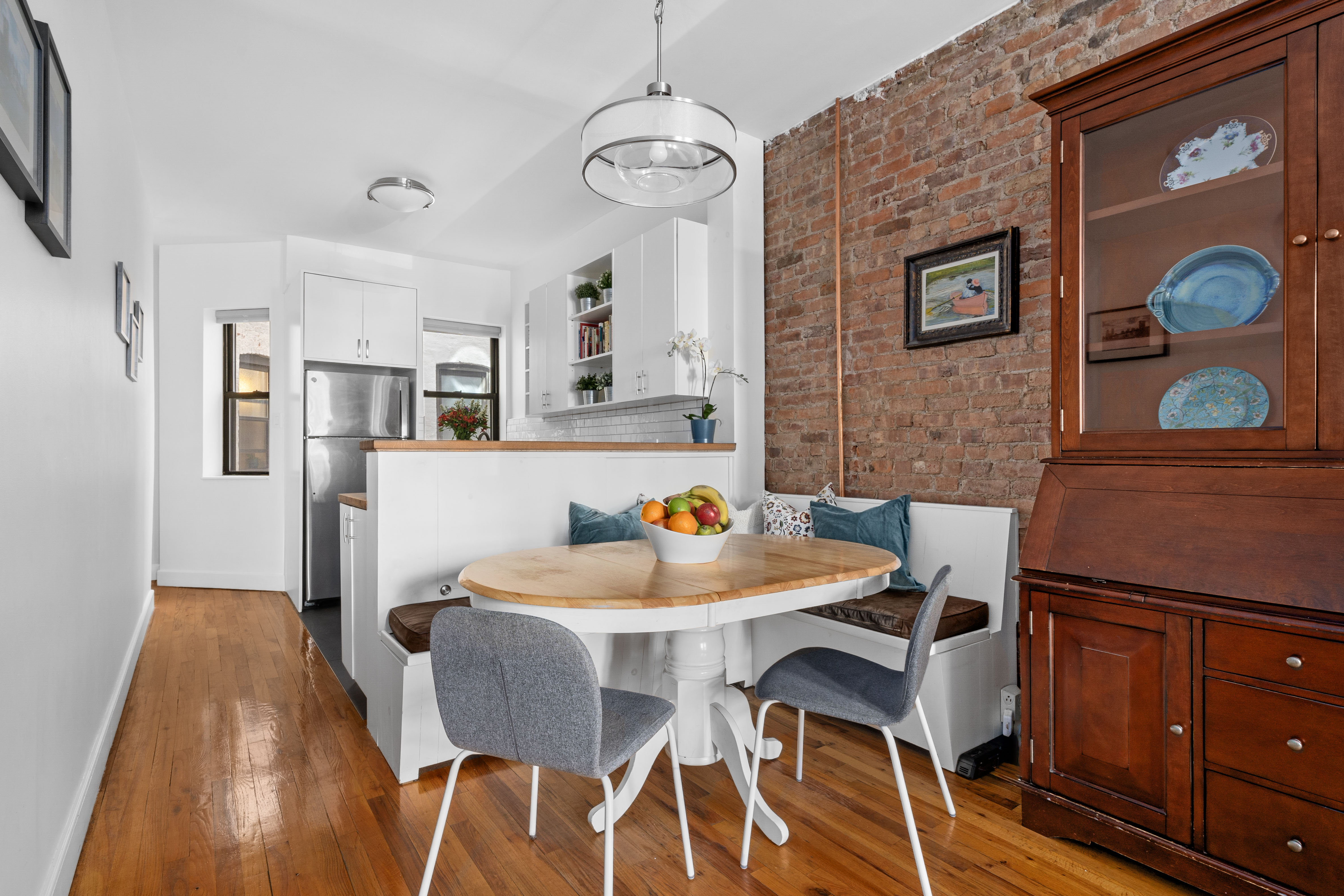 456 15th Street, Unit 1R Brooklyn, NY 11215 - Photo 2 of 14 a view of a dining room with furniture and wooden floor