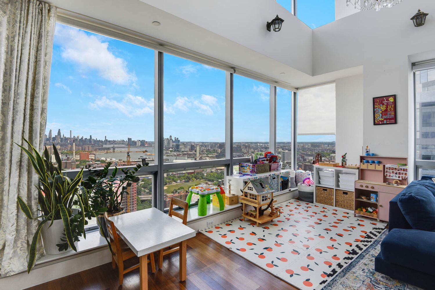 150 Myrtle Avenue, Unit PH3201 Brooklyn, NY 11201 - Photo 7 of 40 a living room with furniture and a floor to ceiling window