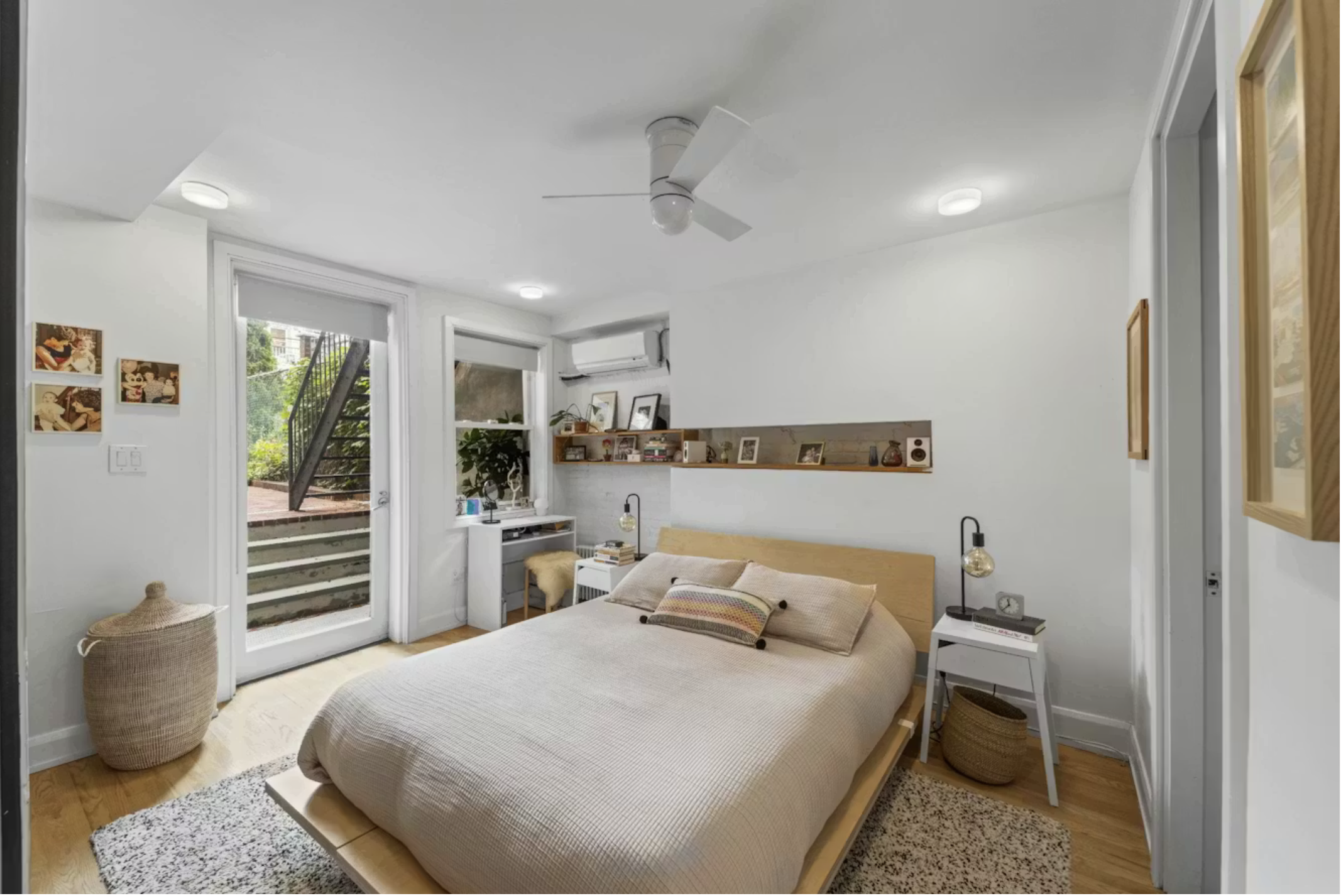 304 Warren Street, Unit 1 Brooklyn, NY 11201 - Photo 4 of 16 a bedroom with a bed and wooden floor