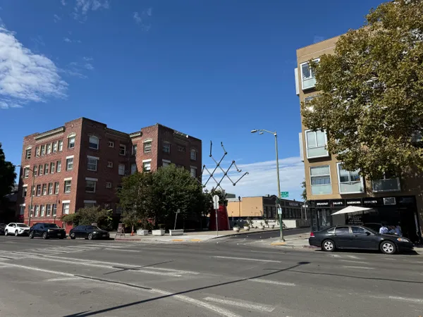 a view of a building and a street
