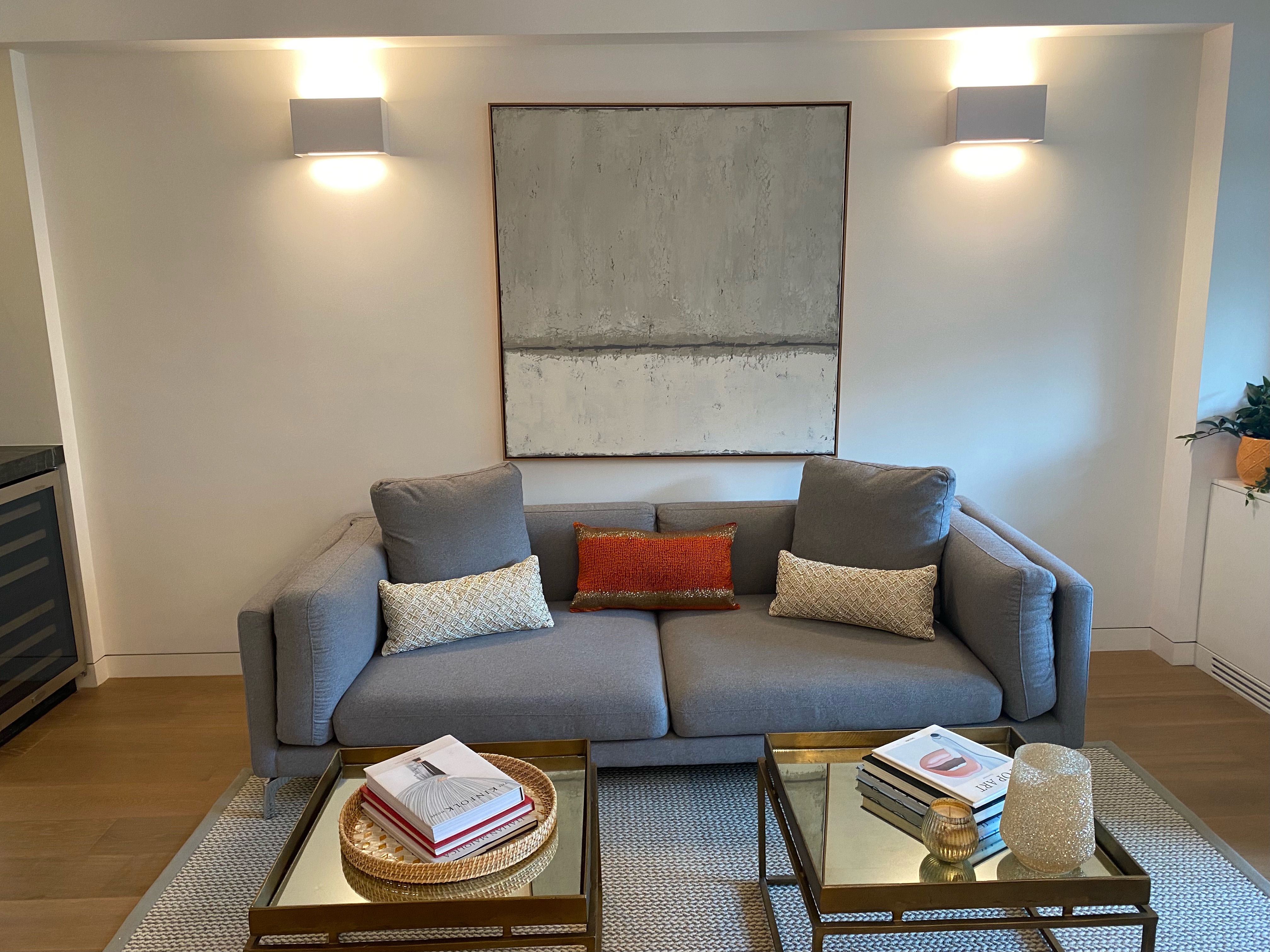 124 East 79th Street, Unit 7D Manhattan, NY 10075 - Photo 6 of 25 a living room with furniture and a mirror