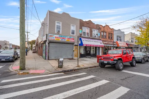 a houses on the side of a street