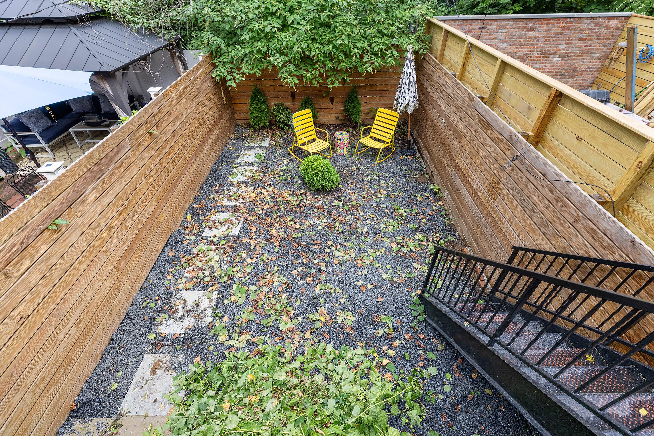 167 Putnam Avenue, Unit MF Brooklyn, NY 11216 - Photo 16 of 19 a view of a back yard from a balcony
