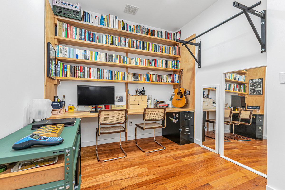 325 Greene Avenue, Unit 3B Brooklyn, NY 11238 - Photo 2 of 7 a room with furniture and a flat screen tv