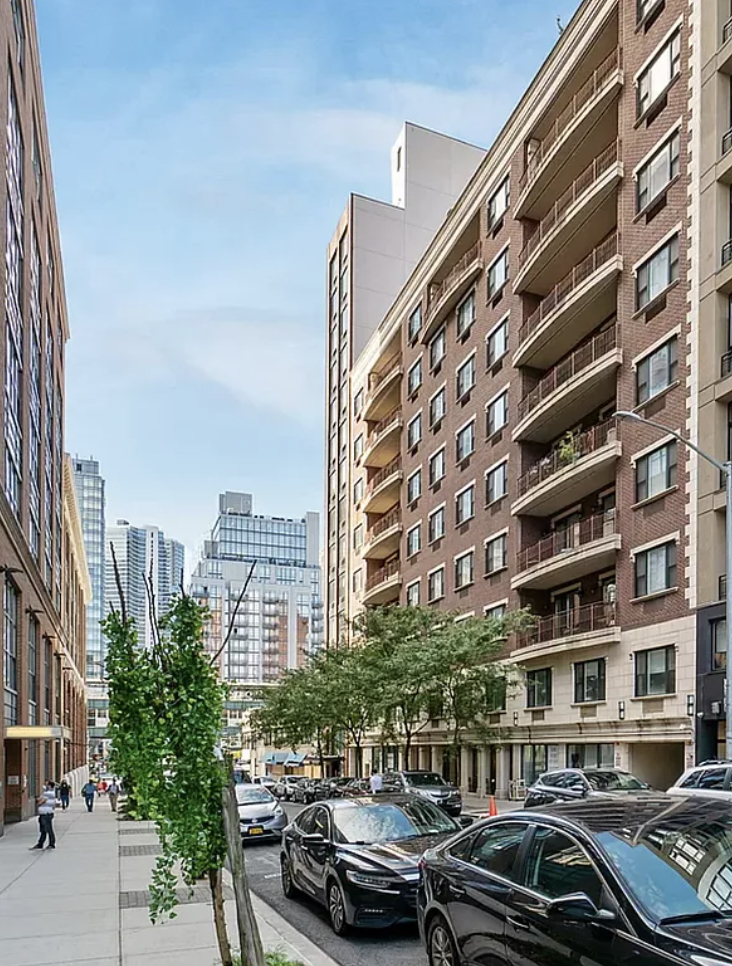 41-26 27th Street, Unit 4H Queens, NY 11101 - Photo 20 of 21 a couple of cars parked in front of a building